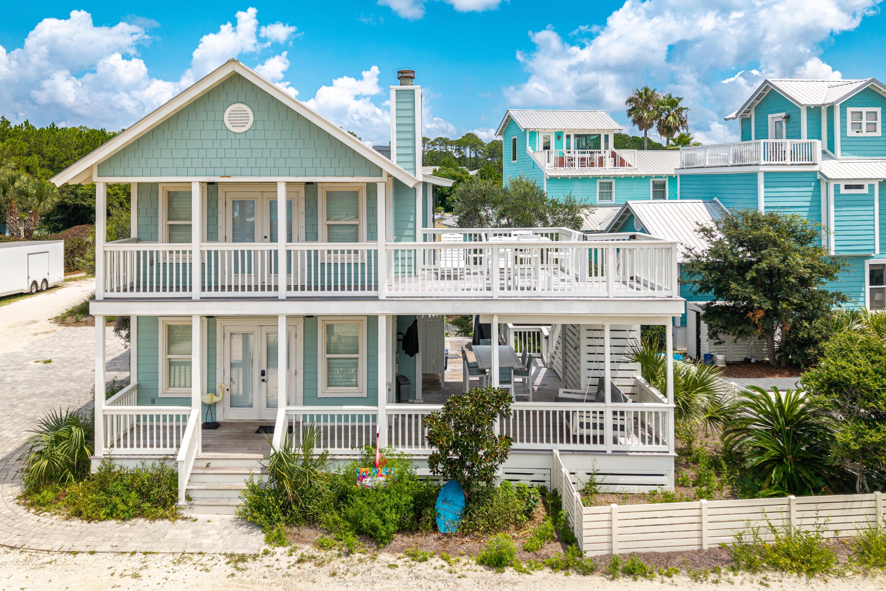 Coastal Home with Gulf Views & Oyster Lake OverlookEnjoy breathtaking Gulf of Mexico views from this beautifully updated 4-bedroom, 3-bath beach home on 30A's desirable west end. Perfectly located just across the street from the beach, this 2-story coastal retreat overlooks both the Gulf and Oyster Lake, offering the ideal blend of scenery, comfort, and convenience in Santa Rosa Beach.Step inside to a bright, open living space with a fireplace, abundant natural light, and panoramic Gulf views. The gourmet kitchen features custom cabinetry, quartz countertops, and professional-grade stainless steel appliances--including a Subzero refrigerator and Viking gas range--perfect for preparing fresh coastal cuisine.Extensive updates completed in 2021 include IPE Brazilian hardwood decking,