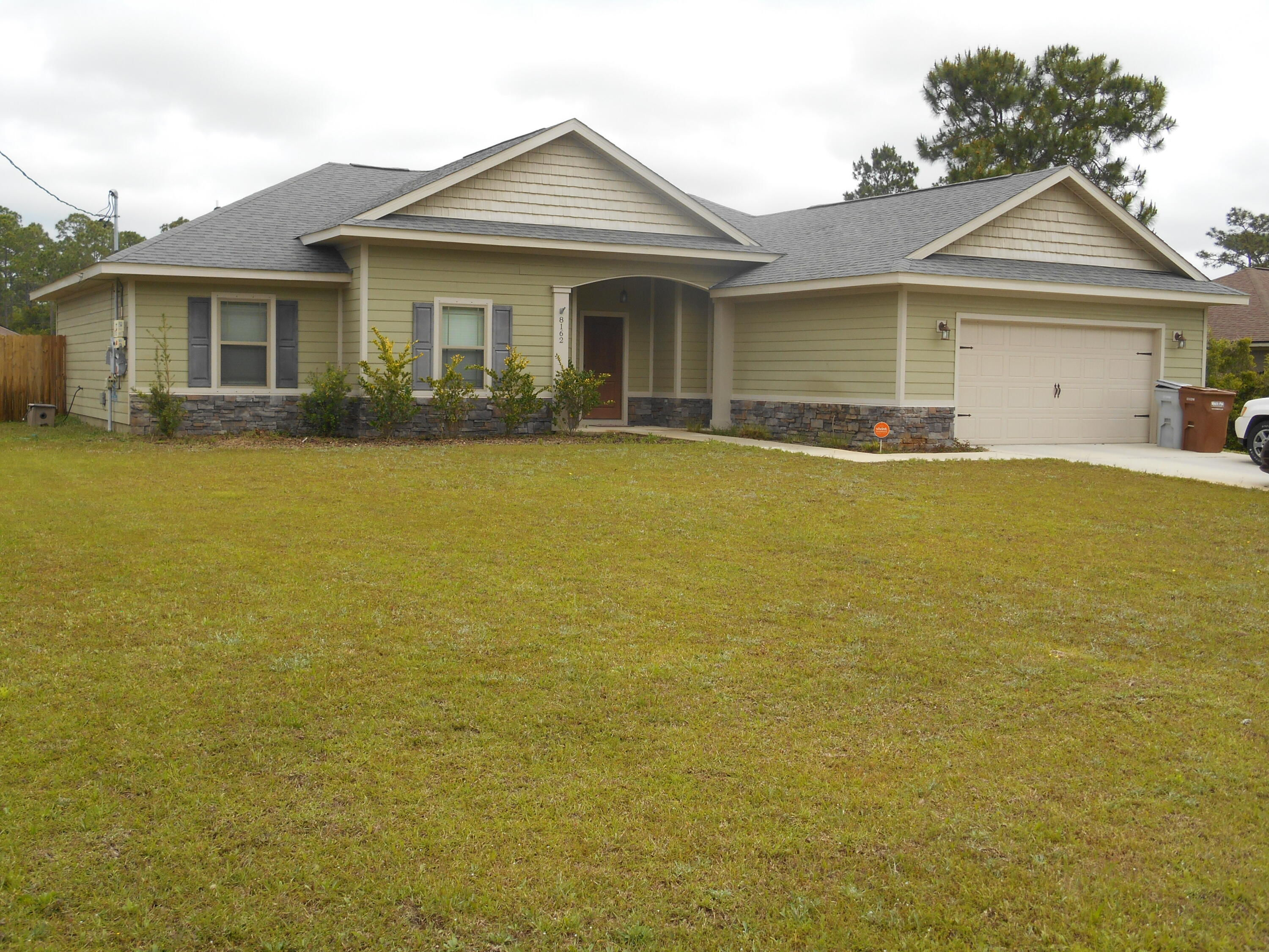 Beautiful energy efficient home with Solar Panels sits in the heart of Navarre close to beaches, schools, shopping and numerous employment opportunities including Hurlburt Air Force Base only 13 miles away.  Split floor plan home with raised ceiling in the living room is very open and family friendly with extras to include accent lighted double tray ceiling in the Master Bedroom, tray ceiling in breakfast nook, under cabinet lighting and built-in wine refrigerator in the Kitchen which also has a large pantry.   Luxurious master bathroom with tile shower and separate soaking tub with tile surround, dual vanities & private water closet..  Seller says Electtric bills average $40 per month.