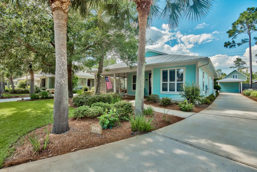 ALL ON ONE LEVEL! This beautiful three bedroom home is located on a cul-de-sac with a large backyard and a much-coveted carport with large storage room - perfect for your golf cart!This meticulous home has never before been rented and conveys with upscale furnishings that include names like Thomasville, Tommy Bahama and Lexington. The open floorplan features Corian countertops and stone-tiled backsplash in the kitchen and laminate wood flooring throughout the kitchen/dining/living areas for an open and airy feel. All windows throughout the home include quality wood shutters. The master bedroom is spacious and includes a large walk-in closet. The master bathroom shower features power jets, and tumbled marble with glass accent tiles and glass shower doors and porcelain tile flooring