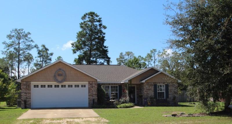 Short Sale but it is not one you want to miss out on! This is one of the prettiest homes on the market in this size and price range! ALL BRICK CONSTRUCTION featuring split bedroom design with large sunny kitchen and dining area. Large living room at the center of the home boasts a cathedral ceiling. Front door is fiberglass with beautiful leaded glass! The dcor of this home is stunning and it is in fabulous condition! Just look at the photos and you will agree! Kitchen has lots of lovely cabinets and the refrigerator remains. Indoor laundry room. Double car garage. Large walk-in closet in the master bedroom. The backyard is beautiful and has a gardening shed and many flowering plants, trees, and an herb garden and the entire backyard is privacy fenced!Don't miss seeing this one!!!