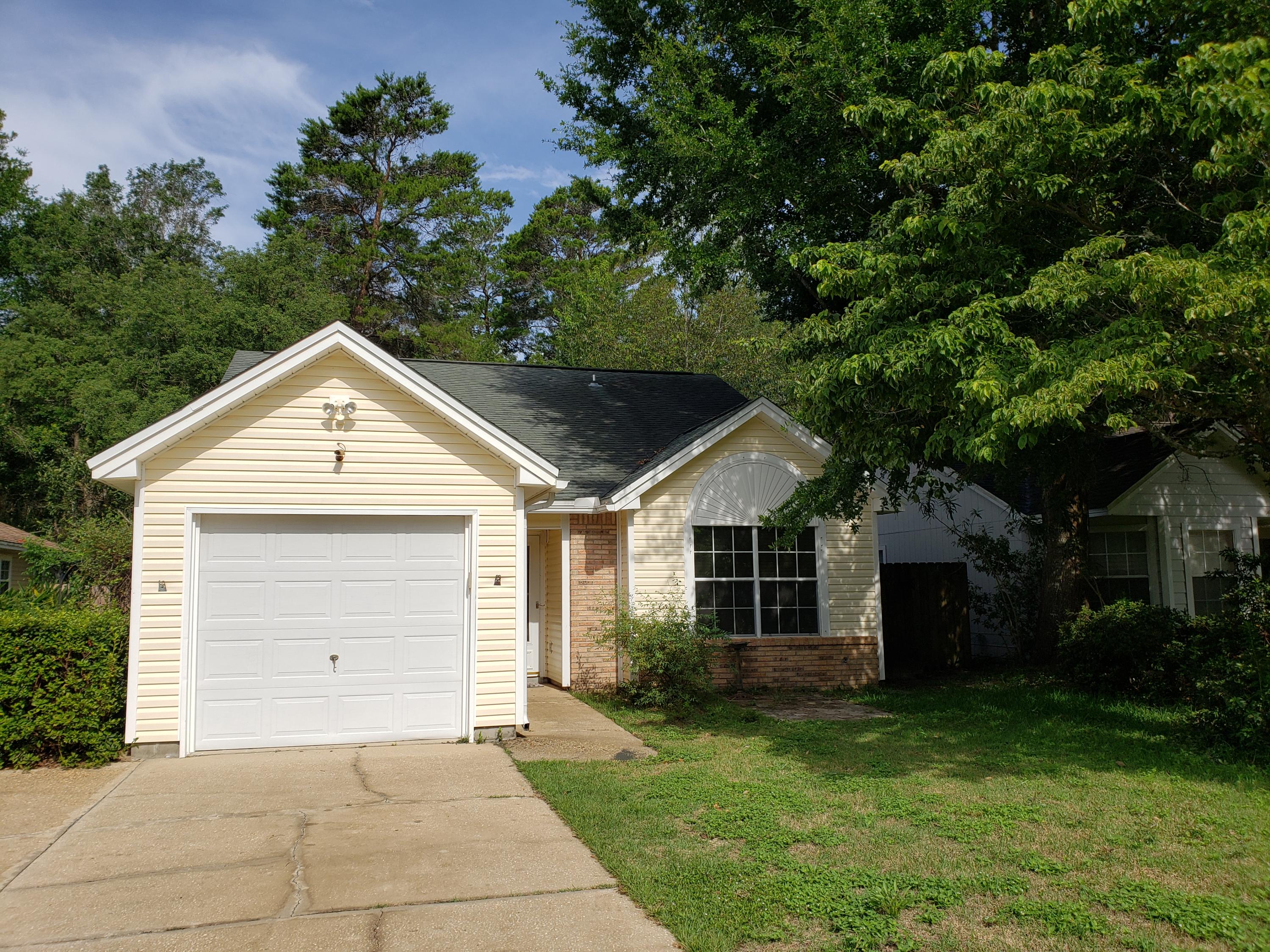 Beautiful three bedroom Florida Cottage in Indigo Village. Living room has vaulted ceilings, a fireplace, wood flooring, and opens into the dining, kitchen, and Florida rooms, giving the home a spacious, open feel. Kitchen includes plenty of cabinet space, 5 burner gas stove, breakfast bar, and is highlighted with open views to all entertaining areas throughout the home--time in the kitchen no longer means time away from the party.The master bedroom has cathedral ceilings and a large walk in closet. Two additional bedrooms, guest bath, and linen closet are separate off their own hallway for the added privacy of a split floor plan.Florida room has plenty of windows providing abundant natural lighting.Large office/study off the Florida room, which could be used as a fourth bedroom