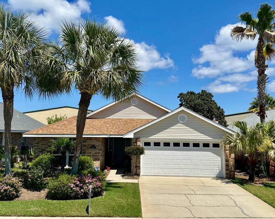 LOCATION is everything! Lowest price per sq. ft. in the neighborhood. This meticulously maintained home is a mere 10-minute walk to the Gulf of America. It's all-brick & vinyl trim which makes for easy upkeep. Land at the end of Dolphin designated for parking, ramps and restrooms for beach goers. Improvements include new roof and facia in 2022, R40 attic insulation, hurricane windows, hurricane garage door and stronger motor, hurricane front and rear doors and hurricane panels for all doors. It has an alarm system, new back fence and gates. There is an added AC return register and all new AC vents.  Duct work has been cleaned and Aero-sealed for optimal efficiency.  Gas oven, heat and fireplace.  Private back yard. Come by and see this, make it your home, second home or rental investmen