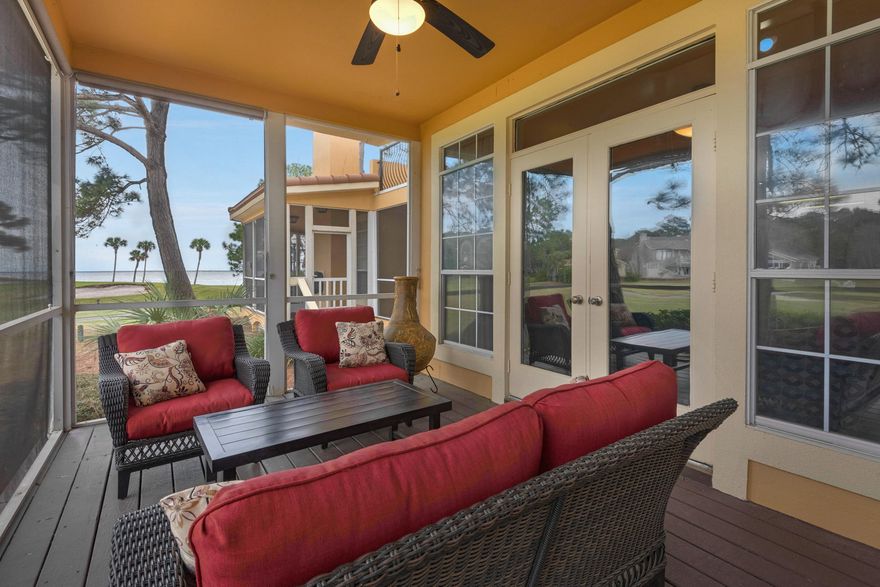 Stunning golf course and Bay views compliment the relaxed flow of this coastal villa tucked away in Sandestin Golf and Beach Resort. The open floorplan offers a gourmet kitchen with granite countertops, stainless appliances and gas range. The oversized living space features hardwood floors and gas fireplace accented by french doors providing ample natural light. The screened patio is the perfect location to sip a cup of coffee and watch the dolphin play in the Choctawhatchee Bay. The first-floor master suite offers an ensuite bath, oversized closet and french doors leading to an outdoor patio. The second floor offers an additional master suite and a guest bedroom, each with a private balcony, en-suite bath and stunning views. Enjoy the extra storage of a garage and two loft areas. This resort property is offered fully furnished.  Enjoy the resort lifestyle of Sandestin with boating at Baytowne Marina, shopping at Grand Boulevard and the sugar white sands of the Emerald Coast Beaches just a golf cart ride away.