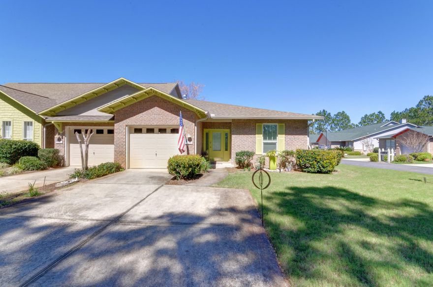 Rare opportunity! Single story townhome in popular Escada! This floor plan does not become available often...so better hurry! Lakeview, corner lot, pride of ownership really shows! In pristine condition, with many recent improvements including wood look tile flooring, quarzite counters, upgraded stainless appliances, remodeled master bath with walk-in shower, customized master closet, impact resistant windows. Great room has a wood burning fireplace, direct access to a large tiled screened porch. Single car garage. Move-in ready! Great location, close to shopping, restaurants, attractions, churches, hospital and beaches. Nature trail from neighborhood for easy access to Butler Elementary, 30A and beaches. Community pool, tennis. HOA fees include pest control, yard maintenance.