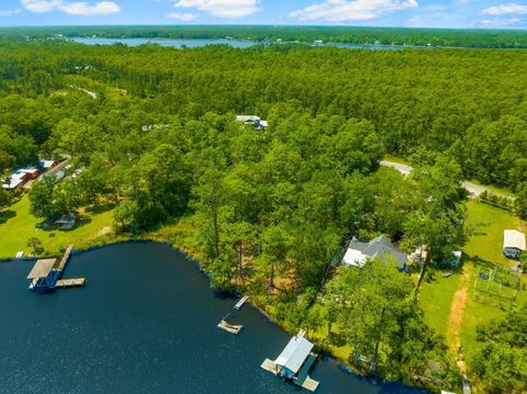 Photo of Lot 26 E Bayou Forest Drive, Freeport, FL 32439 (MLS # 986444) Photo of Lot 26 E Bayou Forest Drive, Freeport, FL 32439 (MLS # 986444)