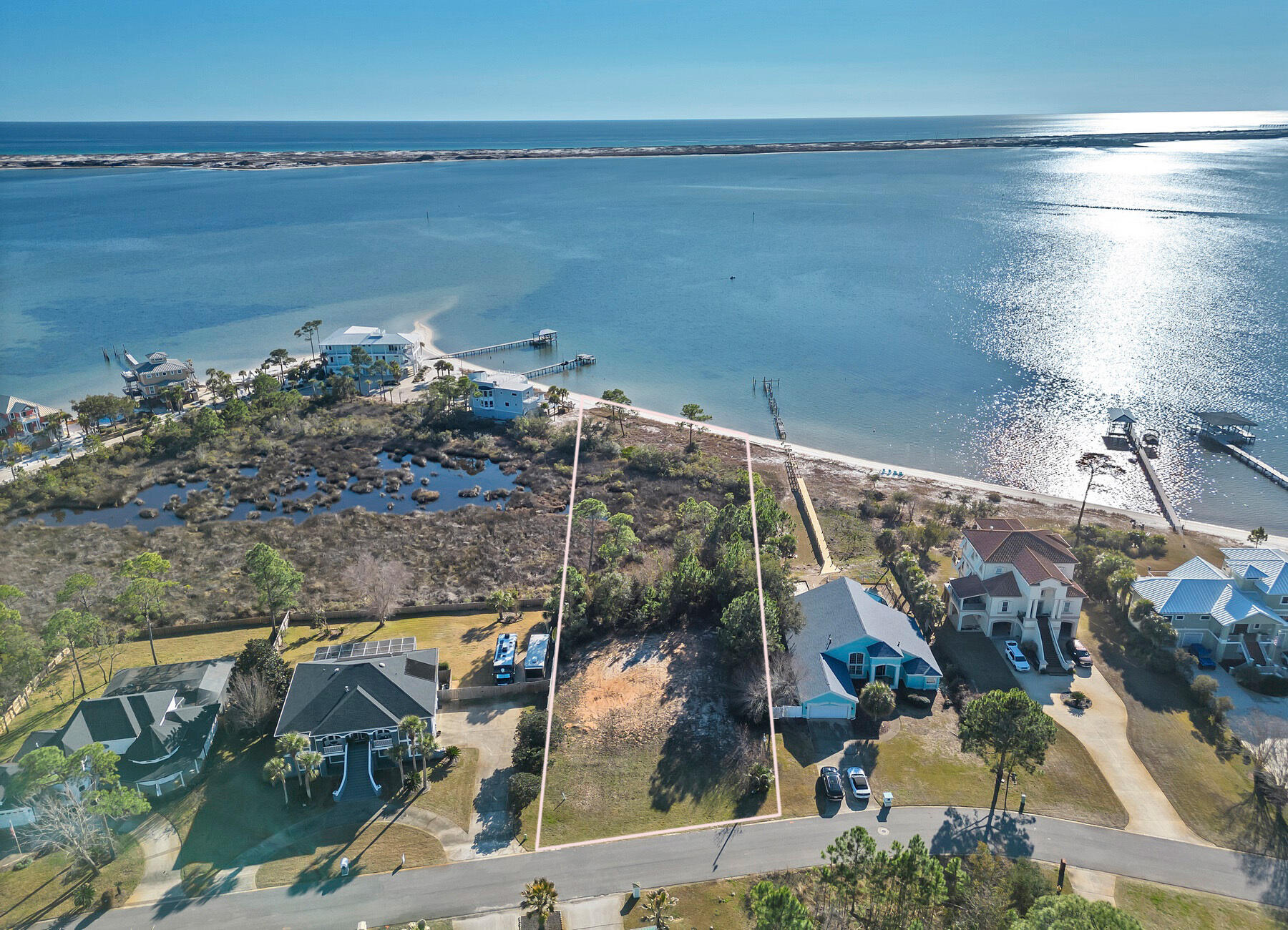 Beautiful waterfront paradise! 95 feet of sound front on almost an acre in Biscayne Pointe. This lot features 95 feet of waterfront on the sound. This is lot is ready for you to build your dream home. This is a very rare find!! The community provides deeded access to the sound with a community gazebo.
