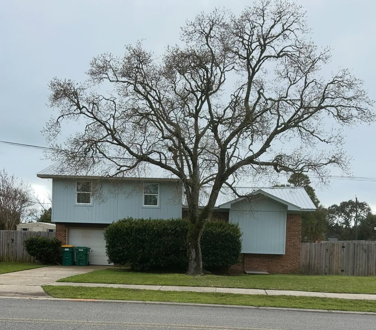Check out this fixer upper in the heart of Destin. Large fenced in back yard. Large hole in backyard where pool needs to be filled in. Home is being sold AS-IS Pictures coming soon.