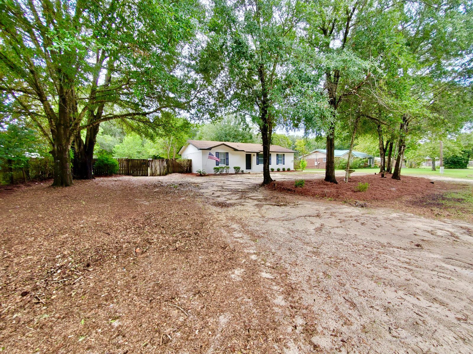 3/2 Renovated Home on close to 1/2 Acre (0.46 AC) Updated Kitchen & brightened up with New Granite counter-tops, new Back Splash, Lights, sink & faucet & New Stainless Steel Appliances. Updated Bathrooms with new vanities, lights, mirror and waterproof flooring. New laminate flooring throughout the home Laminate in main areas and carpet in bedrooms. New blinds, New Paint inside and out. Enjoy the large fenced in backyard with Open Patio, covered porch and an area to work on your hobbies in the 1 car carport, covered storage area and storage shed. Room sizes approx. buyer to confirm.