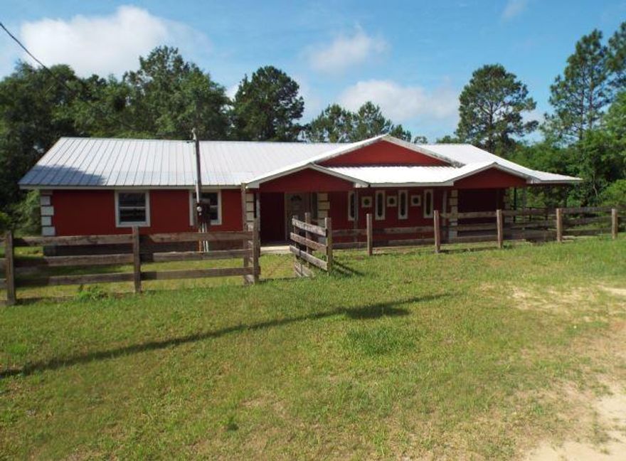 Investor's delight! REO property with acreage for sale at a great price. The kitchen has wood cabinets and tile floors. The spacious living room features wood ceilings, wood walls and fireplace. The bedrooms have carpet or hardwoods and are a good size for a home with these dimensions. Master bathroom with jetted tub. Private, fenced-in yard is great for outdoor activities. Enjoy convenient access to schools, shopping and I-10. The property at 319 Lakewood Drive, Defuniak Springs, FL, is a residential, single-family property with 3 bedrooms and 2 bathrooms, built in 2000 and 2,280 square feet.