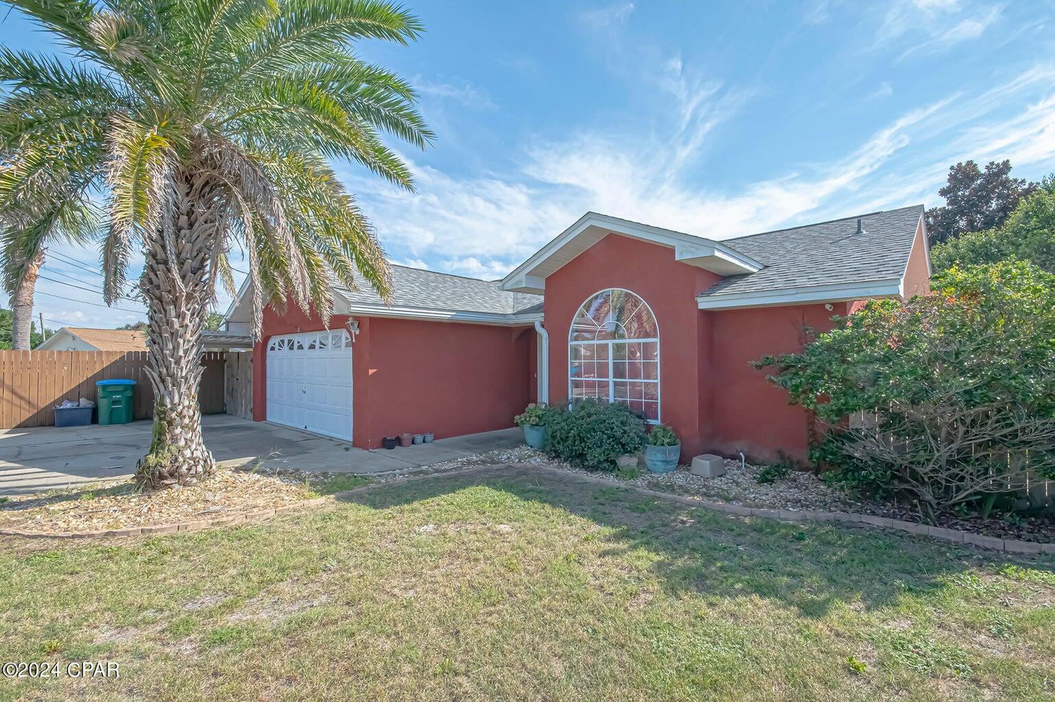 Welcome to 17005 Guava Ave, a stunningly updated home nestled within the vibrant, ever-so-inviting Panama City Beach. Whether you're eyeing a second home, a vacation rental, or a primary residence, this property presents itself as a superb option in today's market. Property Overview Originally built in 1993 with an effective year of 2013, this home seamlessly blends classic charm with modern updates. It features 1,575 square feet of living space, thoughtfully designed to offer both comfort and flexibility. Enjoy the luxury of 3 bedrooms, complemented by an additional office that could easily serve as a 4th bedroom -- perfect for accommodating guests or creating a work-from-home sanctuary. Updated For Modern Living Step into a fully renovated kitchen boasting stainless steel appliances, granite countertops, and custom cabinets. The modern finishes continue in the master bath, expertly redesigned with a walk-in shower and a double vanity, a visual and practical delight. Fresh interior paint and new luxury vinyl plank flooring provide a chic and inviting atmosphere throughout. Recent additions like a new HVAC system ensure comfort year-round. Outdoor Oasis Outside, enjoy the serenity of a fenced backyard, ideal for family gatherings or simply winding down with a good book. A custom patio and bar area serve as the ultimate entertainment hub, surrounded by tasteful landscaping that enhances the home's relaxing vibes. Whether it's morning coffee or evening cocktails, your outdoor space is ready for every facet of Florida life. Location, Location, Location Situated a short walk or golf cart ride from the pristine beaches and within minutes to the lively Pier Park, this location offers the best of coastal living. Engage in all the action Panama City Beach has to offer, knowing your serene retreat is never far away. Market Insights While the market may into a fully renovated kitchen boasting stainless steel appliances, be a touch slower as of late, this home distinguishes itself with its thoughtful renovations and ideal location. Compared favorably against other offerings, it stands as a smart choice for buyers seeking both investment potential and lifestyle enrichment. Don't miss the chance to take advantage of this remarkable opportunity. Ready to explore further? Reach out today!