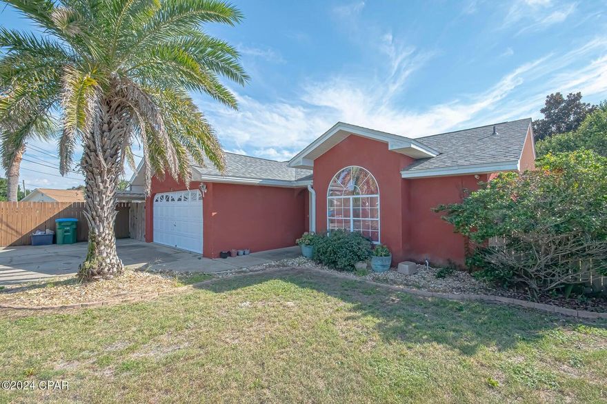 Welcome to 17005 Guava Ave, a stunningly updated home nestled within the vibrant, ever-so-inviting Panama City Beach. Whether you're eyeing a second home, a vacation rental, or a primary residence, this property presents itself as a superb option in today's market. Property Overview Originally built in 1993 with an effective year of 2013, this home seamlessly blends classic charm with modern updates. It features 1,575 square feet of living space, thoughtfully designed to offer both comfort and flexibility. Enjoy the luxury of 3 bedrooms, complemented by an additional office that could easily serve as a 4th bedroom -- perfect for accommodating guests or creating a work-from-home sanctuary. Updated For Modern Living Step into a fully renovated kitchen boasting stainless steel appliances, granite countertops, and custom cabinets. The modern finishes continue in the master bath, expertly redesigned with a walk-in shower and a double vanity, a visual and practical delight. Fresh interior paint and new luxury vinyl plank flooring provide a chic and inviting atmosphere throughout. Recent additions like a new HVAC system ensure comfort year-round. Outdoor Oasis Outside, enjoy the serenity of a fenced backyard, ideal for family gatherings or simply winding down with a good book. A custom patio and bar area serve as the ultimate entertainment hub, surrounded by tasteful landscaping that enhances the home's relaxing vibes. Whether it's morning coffee or evening cocktails, your outdoor space is ready for every facet of Florida life. Location, Location, Location Situated a short walk or golf cart ride from the pristine beaches and within minutes to the lively Pier Park, this location offers the best of coastal living. Engage in all the action Panama City Beach has to offer, knowing your serene retreat is never far away. Market Insights While the market may  into a fully renovated kitchen boasting stainless steel appliances, be a touch slower as of late, this home distinguishes itself with its thoughtful renovations and ideal location. Compared favorably against other offerings, it stands as a smart choice for buyers seeking both investment potential and lifestyle enrichment. Don't miss the chance to take advantage of this remarkable opportunity. Ready to explore further? Reach out today!
