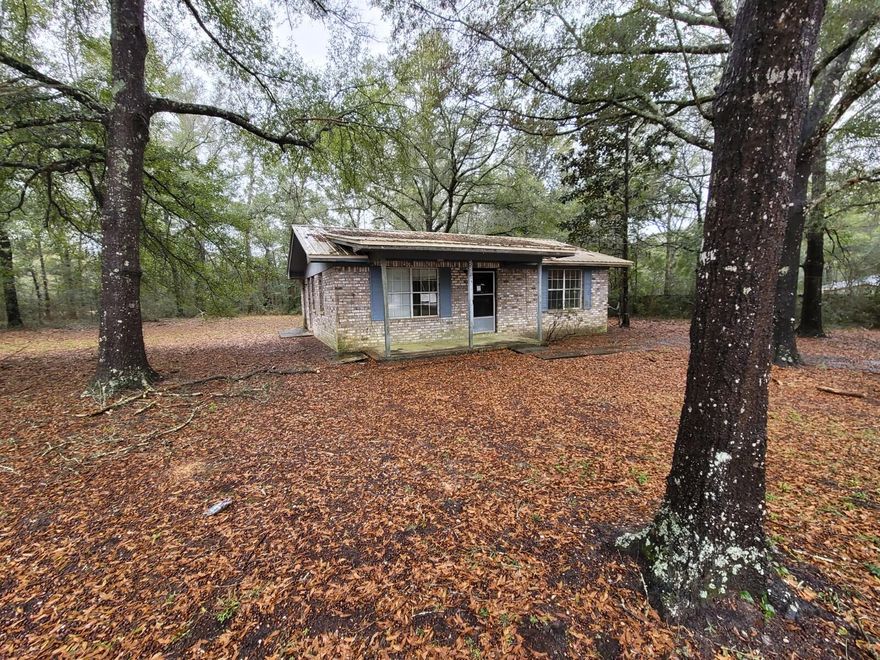 Investor special Cash or looking to pre-sale fixed!! Sold as is where is. Solid 1994 Brick home in need of cosmetics only. Metal roof. 

2/1 900 Feet .70 Of Acre.. 

Bay Living will consider fixing up and getting financing for buyer at $165,900..