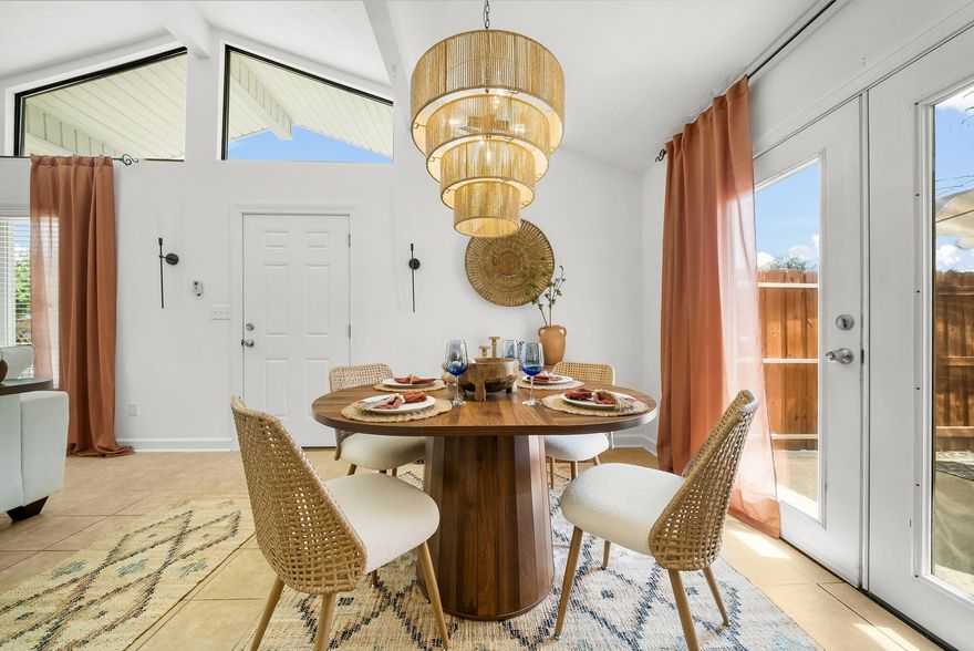 Just 450 steps from the sand, this stunning beach cottage was professionally designed by Casa Marina Lifestyle for style, comfort, and rental potential. Perfect as a high-performing investment, beach retreat, or full-time home.Inside, enjoy vaulted ceilings, natural light, and open living spaces blending coastal elegance with Mediterranean flair. The kitchen has brand-new stainless steel appliances, bathrooms feel spa-like, and bedrooms include large TVs. Two outdoor sheds add extra storage.Outside, the backyard has room for a pool, dining, or gatherings, plus an outdoor shower and parking for a boat. Across from Rick Seltzer Park, enjoy beach access, showers, restrooms, and parking. No HOA,  with newer roof, AC, and 2025 water heater.