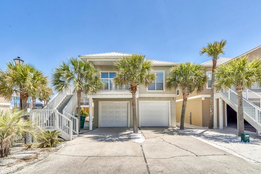 THE PERFECT BEACH HOME Opportunity, Don't Miss this, Best Deal & Lowest Priced Home on the Beach! Just 200 feet from access to the Santa Rosa Sound Beach & Private Dock, where you can enjoy Fishing, Water Activities, and Breathtaking Sunsets & Sunrises. This superbly nurtured 3 Bed/2 Bath Open Floor Plan Boasts 9 Foot Ceilings throughout and lets in plenty of light and comfort, as well as having Tiled floors in the main areas, a sizable Kitchen with Plenty of Cabinetry, a Spacious Dining & Living area, equipped w/ two Large Balconies, a formal & Oversized 2 Car Garage for all your Toys and Vehicles, large covered back Patio, comes Fully Furnished with a few exclusions, and has a Metal Roof for Longevity. Come Visit and Stay in this Well Maintained & Desired Neighborhood... More....