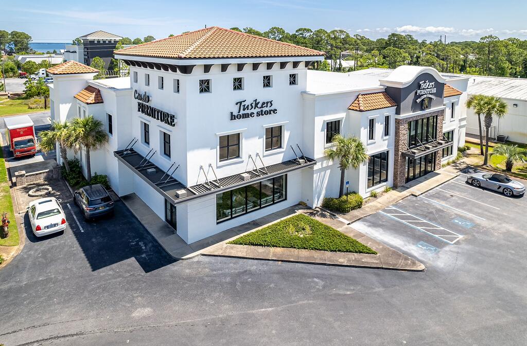 THIS LISTING IS OFFERING THE RETAIL BUILDING along HIGHWAY 98 SEPARATE from the ADJACENT WAREHOUSE & SUPPLEMENTAL SHOWROOM BUILDING LOCATED (MLS 979969) at 106 N Geronimo Street, Miramar Beach, FL 32550. This rare assemblage of prime retail, showroom, and warehouse is an extreme rarity in the local market, which is adjacent to the synergistic retail nucleus of Silver Sands Outlet Mall, Grand Boulevard, Destin Commons, and Sandestin, and centralized to all the local mixed-use districts, successfully drawing population from all local peripheral sub-markets, including but not limited to Destin and Scenic 30A of Santa Rosa Beach, Florida. Fronting Highway 98 in Miramar Beach, Florida, nearly 50,000 vehicles pass by its 196 fronting feet daily, which ingress and egress lures the... traffic into the retail facilities through the convenience of the traffic light at North Geronimo Street and Highway 98. The current owner has committed significant capital to renovate both buildings, which even includes approximately $300,000+ for new escalators to service the second floor of the main showroom. Parcel 1 contains a two-story building, oriented on approximately 1.18 acres, hosting prime retail and showroom space, as well as private offices, collectively measuring approximately 26,893 conditioned square feet. There is a 3rd floor that accommodates a spectacular executive office, accessible via a private & secured "floating" staircase. The structural integrity of the building is phenomenal, and the finishes throughout are exceptional. Parcel 2 contains a warehouse, office, and showroom, situated on approximately 2 acres, and constructed in 2004, measuring approximately 11,282 square feet on two floors. The warehouse contains a broad loading dock area and massive rack system with a lift and guide rails. Both buildings project an architecturally magnificent image. This opportunity is irreplaceable locally, as land development code would neither accommodate this massive yield, nor would a developer endeavor upon such a project, as the inflationary costs of this era, coupled with land costs, (even if such prime vacant land at a traffic light were available), which is non-existent), would likely much exceed $20,000,000+. The current business is operating a record-breaking levels, year over year; thus the attributable value to this extremely prime site and assemblage is likely understated. All showings are by appointment only and require 48+ hours advanced notice. The listing broker must accompany all showings. Financial credentials are required prior to confirmation of any showings. Please do not approach any onsite staff.