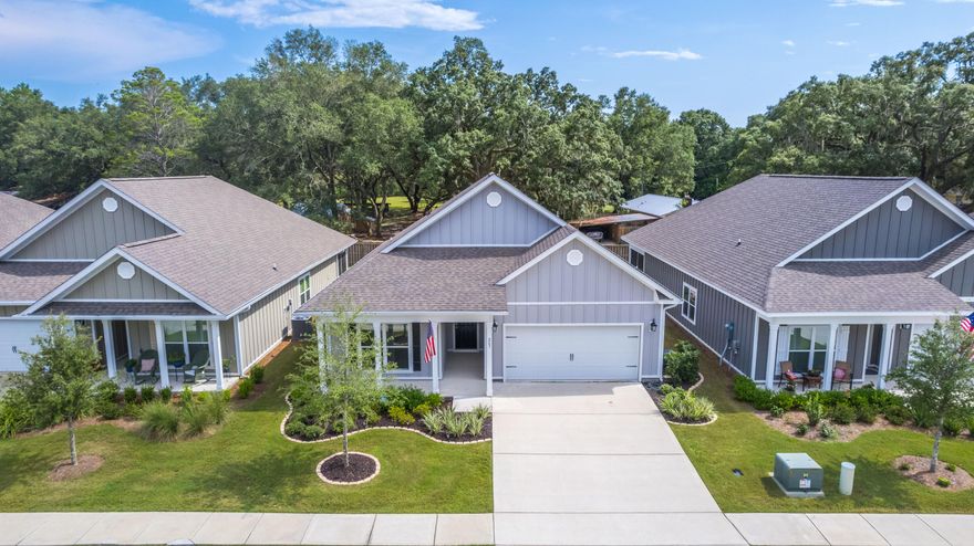 New Pictures and Virtual Tour. LIKE NEW 2020 HOME. MOVE IN NOW and live the FIREFLY life at Hammock Bay in an ARLINGTON plan with open floor plan, granite counters, elegant 9 ft ceilings and beautiful landscaping in front and backyards. This home is constructed with 4 sided Hardie, aluminum fascia with vinyl soffits a reinforced foundation, weather resistant house wrap barrier and dimensional shingles with a 30 year warranty. EVP flooring throughout common areas, carpet in all bedrooms, stainless appliances including stove, microwave, dishwasher and fridge.  Community pool, clubhouse, playground and courts just down street. Wrought iron fence creates a wonderful outdoor space with flower beds and fire pit.