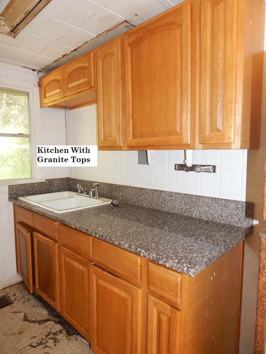 Handyman special located on a dead end street on a beautiful lot. This property is very private but located in the middle of town. This home has a package central AC Unit, Granite Counters in Kitchen and Bath, Granite Surround in the Bathtub. The Living Room and Bedroom Flooring is Hardwood. The septic tank was just pumped. This home is being sold as-is and will not qualify for financing. Great deal for this location. Buyer to verify schools, measurements and anything of importance. Seller has never occupied the property.