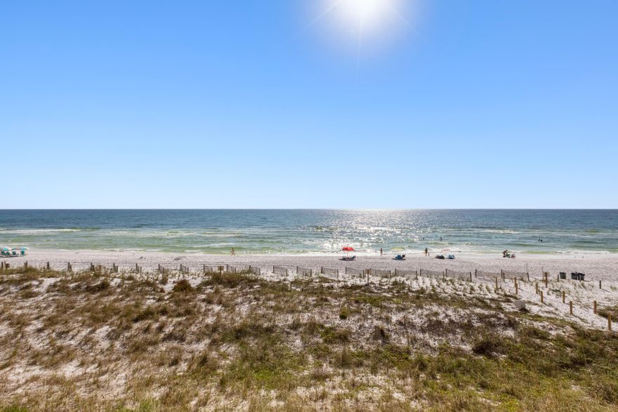 With over $60,000 of improvements, you will be hard pressed to find a property this beautiful and rental ready directly on the Gulf for this price. Breathtaking forever views of the sand and water. With 1286 finished space, this 3 bedroom, 2 bath condo has all the bells and whistles. Smooth ceilings, bright and airy with open design. New LVP flooring throughout. Fabulous bath and kitchen remodels.See document section for upgrade list. Quaint complex, gated for the utmost in privacy. Community pool, hottub, grilling area and deeded beachfront. Situated on historic Scenic Gulf Drive, a 6 1/2 mile beach road with biking, running and walking paths, multiple beachfront restaurants, bars and live music venues.Please note: Emerald Dunes is a smoke free community.