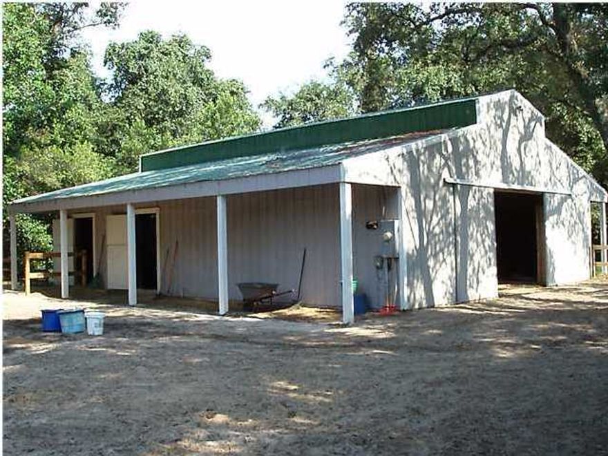 FOUR LARGE ADJOINGING LOTS!! (EACH 100' frontage by 180' deep). Located 20 minutes from downtown Destin, Florida, on the edge of Niceville/Bluewater Bay, and 300 yards from the Eglin Air Force Base reservation where you can ride or hike for miles. You will not find another property like this one for building your dream home: close to Destin and the beach, with beautiful old oak trees. The property is fenced, has a deep water well for the installed sprinkler system and two buildings. One is an all tongue-in-groove siding storage building that was originally a 4-stall stable with tack room and rest room. The other is a heavy timber building with two dirt bays and two concrete bays for storage. This unique opportunity is a few blocks inside the Niceville bypass road. Most vacant lots require