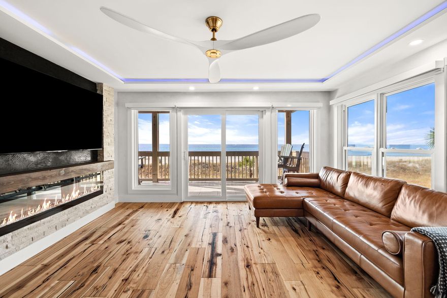 Here's the One!  You will not find anything like this one. Premier beachfront property w/ west-facing windows & panoramic Gulf views has 600 ft of private beach. Paradise on the water, Unit 34 has a newly-completed chic & modern renovation. All new sliding glass doors, windows & hardwood flooring throughout. This condo has been customized with waterfall quartz countertops, Venetian plaster walls & motorized shades on all windows. Setting itself apart, there's a gorgeous stone fireplace with a black Venetian plaster backdrop. Custom lighting, raised ceilings & a built-in bar. The kitchen has soft close shaker cabinets, island & all new appliances.Outside on the spacious 30x10 gulf-front balcony is a swinging day bed with expansive gulf views and amazing sunsets.  5 Star Luxury property!