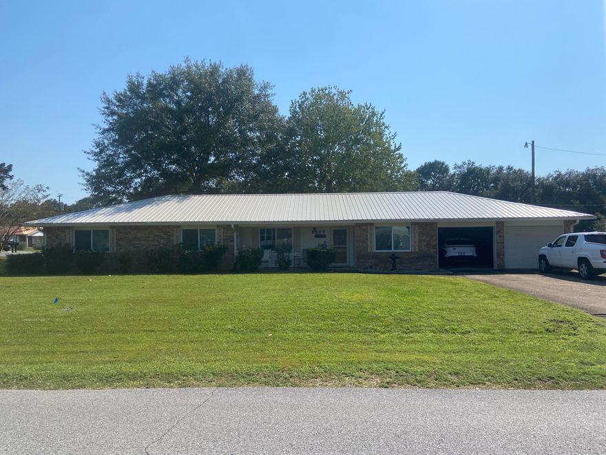Price Reduced Feb15, $449,900. Convenient to shopping, restaurants, schools and 2 miles to the beach. This Home has lots of space and plenty of storage.  A lot of love has been put into the care and condition. On the disclosure the owner has listed the improvements over the years as well as the easy and convenient extras to maintain the residence.  There is a well & irrigation system .  The work shop / garage is large  enough for tools  and a 3rd vehicle.  The work shop/ garage is 'AS IS'' and will not be repaired there is a new garage door on it.  The windows on the house comes w/ warrantee 2022, roof 2021, gutter & filter 2021 limited lifetime, A/C 2011, compressor 2020, Generac 2022, gas line 2021, hot water tank 2021, stove top gas 2021, oven electric 2011, Refrigerator 201 windows w/ warrantee 2022, roof 2021, gutter & filter 2021 limited lifetime, A/C 2011, compressor 2020, Generac 2022, gas line 2021, hot water tank 2021, stove top gas 2021, oven electric 2011, Refrigerator 2015.
