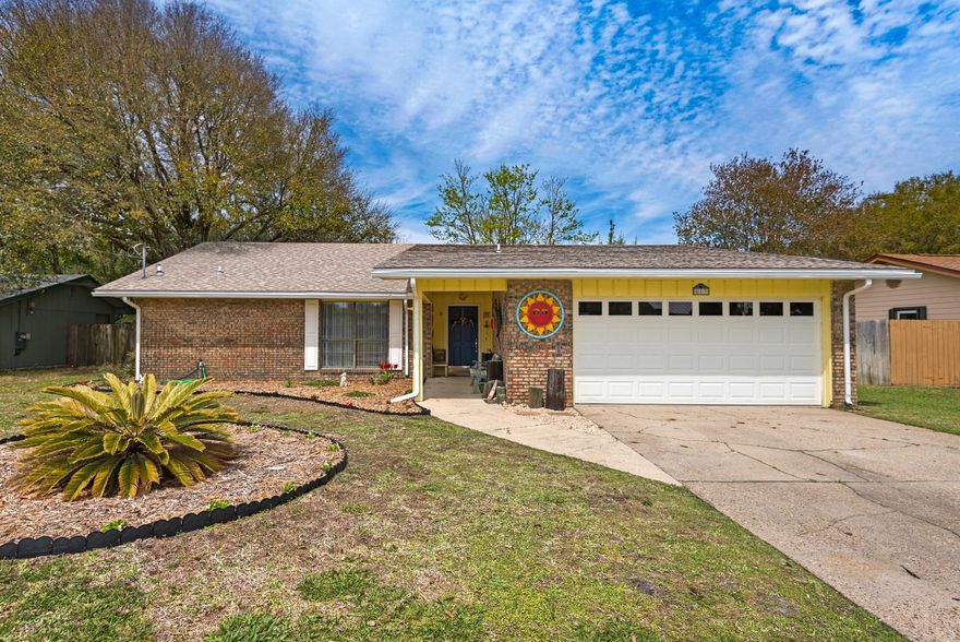 Live a life less ordinary! Larger 1800-SF home in the heart of Destin on a 0.25-acre lot - no HOA fees! This delightful and relaxed 3 Bedroom, 2 Bath, single level home incorporates an eclectic vibe from the mellow yellow exterior to the interior! Tile floors throughout the living areas for easy Florida living, and a HUGE Florida Room that overlooks the spacious yard. IMAGINE the possibilities, says John Lennon, from over the brick fireplace! Home features a large Living Room, Dining Room (currently utilized as a home office), Kitchen with eat-in breakfast room, three bedrooms, two baths, and a large 29.5 x 12 Florida Room with tile floors built in 2002. Large Master Bedroom is 19 x 11.6. Home is move-in ready, but would be ideal floor plan to update/renovate to suit a new buyer...more Convenient to all of the local attractions along the Harbor in Destin, watersports, fishing, dining and retail, in addition to close proximity to churches and Destin Elementary School and Destin Middle School. Live life like a local and avoid the traffic on Hwy 98! Great location in a well maintained neighborhood with sidewalks. 

