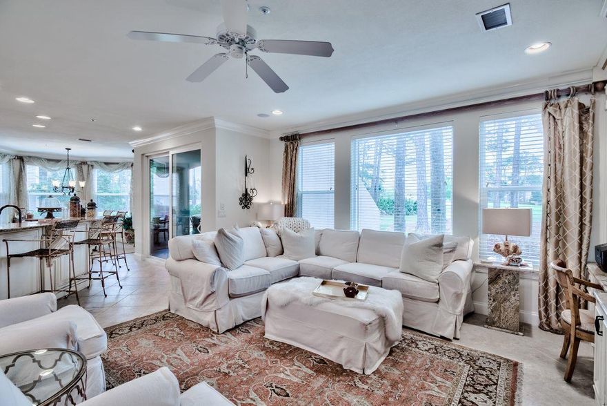 Looking for the convenience of a condo offering the floorplan and storage of a home? This ground floor villa with golf course views has it all! Expansive windows bathe the open floor plan with natural light. The spacious interior is highlighted by a designer kitchen featuring granite countertops, exquisite tile backsplash and stainless appliances. The master suite is a private retreat with an oversized walk-in closet and ensuite bath featuring frameless glass shower, dual sinks and a seated vanity. The elegant decor is carried throughout the two spacious guest bedrooms, each with ensuite baths. Storage is abundant with three outdoor closets, perfect for bikes and beach toys, as well as an interior owners closet. Additional upgrades include crown molding,  built-in bookshelves and a screened porch with lake views and brick paver patio. This is the perfect beach retreat for a vacation rental, second home or primary residence. This property offers a premier location near the Baytowne Marina, Sandestin Tennis Center, The Village of Baytowne Wharf and the Turnberry Pool. Enjoy the resort lifestyle of Sandestin with boating, shopping, entertainment, and the sugar-white sands of the Emerald Coast Beaches just a golf cart ride away.