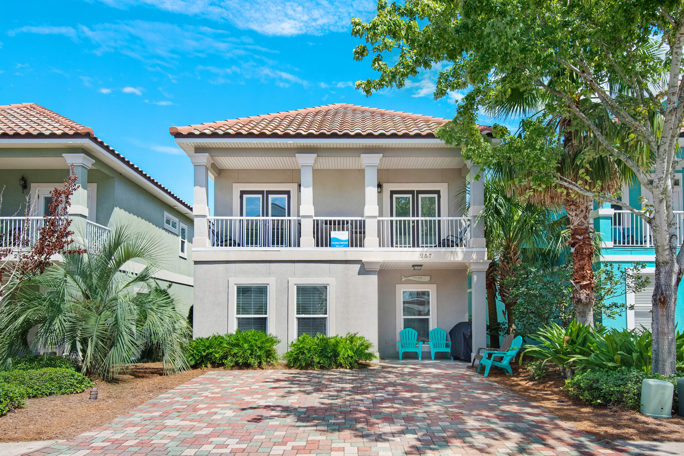 This spacious and stunning beach home features both modern amenities and architectural character in a fantastic, gated beach community. A short-term rental machine boasting a phenomenal history. Qualified buyers can purchase for only 10% Down!2 Master Suites (1 downstairs and 1 upstairs) - This is one your family, friends and vacationing guests will enjoy for a lifetime. The kitchen highlights stainless steel appliances, endless countertops, white storybook cabinetry + more! Sold Fully Furnished! The home features the coveted 'open floor concept' w/ gorgeous new decor, furniture + so much more! Enjoy spanning southern sunsets from your private deluxe-size balcony. Just steps to Destin's famous beaches, the oversized lagoon pool, steamy hot tub + more! This home is 4 bedrooms, 3 1/2 baths, with a separate loft/Bonus Room upstairs. The main master suite bedroom is on the first floor, which is a big rental feature. It features a shower, a separate bathtub and a closet.This exquisite home was crafted by Todd Stephens of Southern American Homes, combining superior craftsmanship and innovative design. The foundation is built with 3000 PSI concrete, reinforced with #5 rebar for exceptional strength and durability. The exterior is completely free of exposed wood, significantly reducing maintenance needs. The columns are made from Kleer Lumber PVC, which comes with a lifetime warranty against rotting, ensuring lasting beauty. The lap siding is a high-performance cement material, securely fastened with screws and rated to withstand winds up to 140 mph.
The balconies feature slip-resistant porcelain tile, providing both style and safety, while the semi-conditioned attic space boasts 8-foot ceilings. The balcony tiles are further protected with a durable Duradek waterproofing membrane. The home is equipped with impact-rated vinyl windows and fiberglass exterior doors, all set in waterproof pans to prevent water intrusion during wind-driven rain.
Energy efficiency is a priority, with 50% of the lighting featuring energy-saving compact fluorescent bulbs. The home is ideally located near wonderful shops, restaurants, and attractions, including golf courses, Big Kahuna's Water and Adventure Park, boating, fishing, and various water sports. A short walk to the Destin Commons shopping area offers over 75 shops and restaurants, including Starbucks, Bass Pro, theaters, and interactive water fountains. It's a perfect blend of luxury, convenience, and proximity to everything you love! Located just steps away from the fabulous lagoon zero-entry pool which features massive waterfalls, a hot tub, & lush tropical landscaping. The property is a short distance from the beach as well & near the back entrance with additional parking you can walk to the beach or there is a trolley available if you want to ride. Welcome Home!