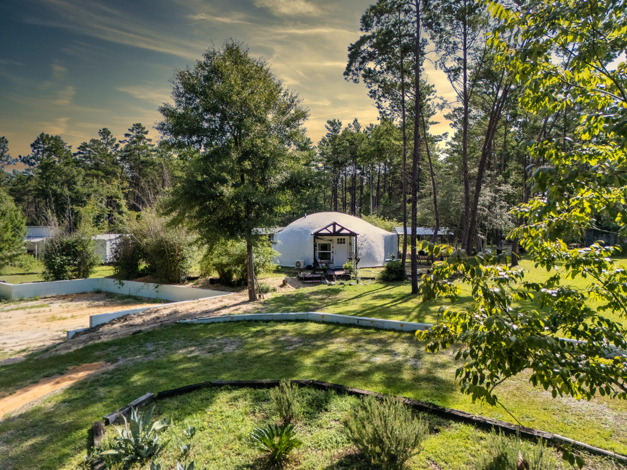 NEW PRIVATE WELL AND CAR PORTDiscover a truly unique living experience in this beautifully designed modular home, thoughtfully set on 4.12 private acres of open space and natural beauty. Blending modern architecture with the serenity of rural living, this one-of-a-kind property offers a perfect balance of comfort, efficiency, and tranquility.GREAT INVESTMENT OPPORTUNITY with washer dryer hook ups SECOND Dome on property ! 2 for 1 !!MORE PHOTOS TO COME SOON!!!
