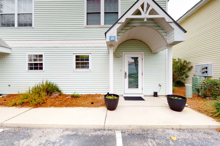 Excellent location for a primary residence, second home or vacation rental with easy access to the beautiful white sand beaches.  Short distance to grocery stores, restaurants and retail shops, including Silver Strands Premium Outlets. Small 30 units professionally managed townhome community and this townhouse is the only unit that has a finished sunroom! This townhouse has the ideal floor plan with a half bath downstairs and 2 bedrooms upstairs with each its own bathroom. There is porcelain wood look tile throughout the first floor, granite countertops throughout and S/S appliances. All doors and windows replaced in 2018 with impact resistant glass and unit has metal V crimp roofing for best wind mitigation with over 1152 sq feet. Sold fully furnished, including washer and dryer.