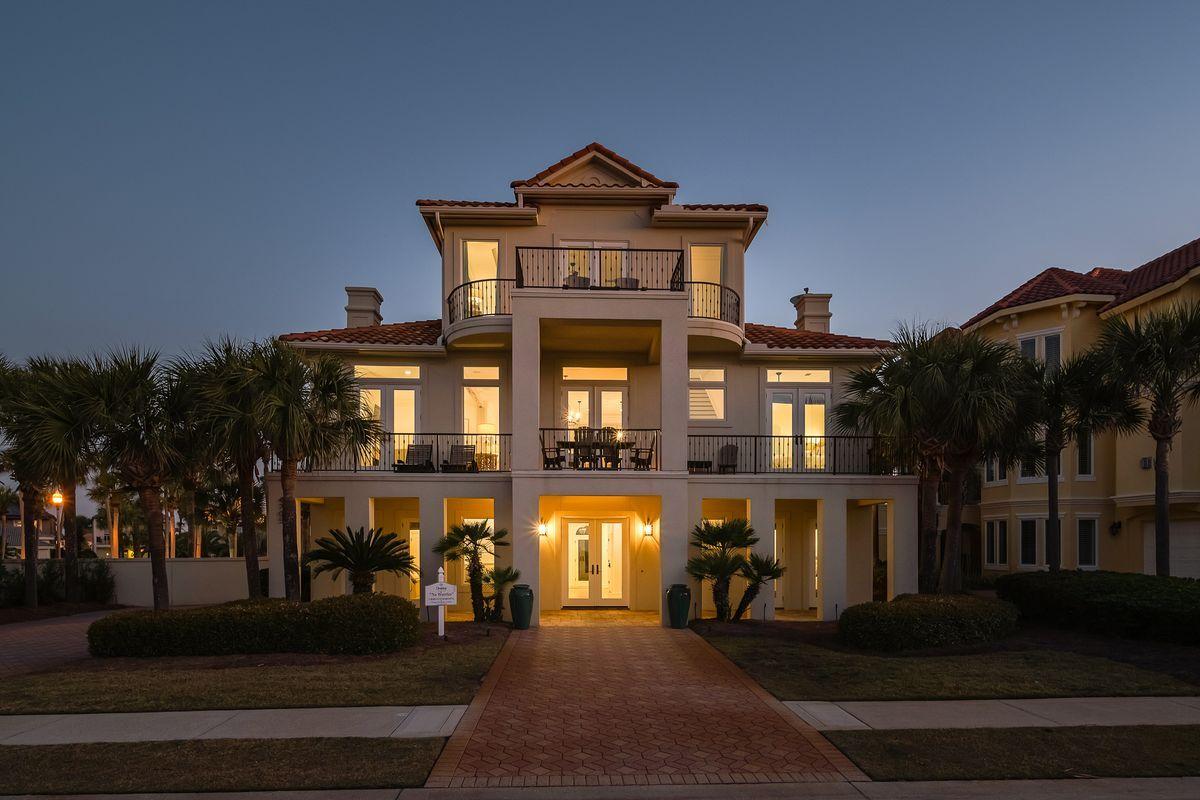 Unparalleled second tier positioning yielding 180 degree Gulf and western views define this beautifully remodeled and finely appointed coastal retreat located in the prestigious guard gated neighborhood of Destiny by the Sea. Reimagined by designer Leigh Ann Harris at Burrow Interior Design and beautifully remodeled by Andy Beno of Old South Homes, this five bedroom home offers exemplary quality with notable finishes and premium design appointments. This home has been utilized as a top producing rental property while being pristinely maintained with historic rental income ranging from $185,000 - $200,000+ annually.