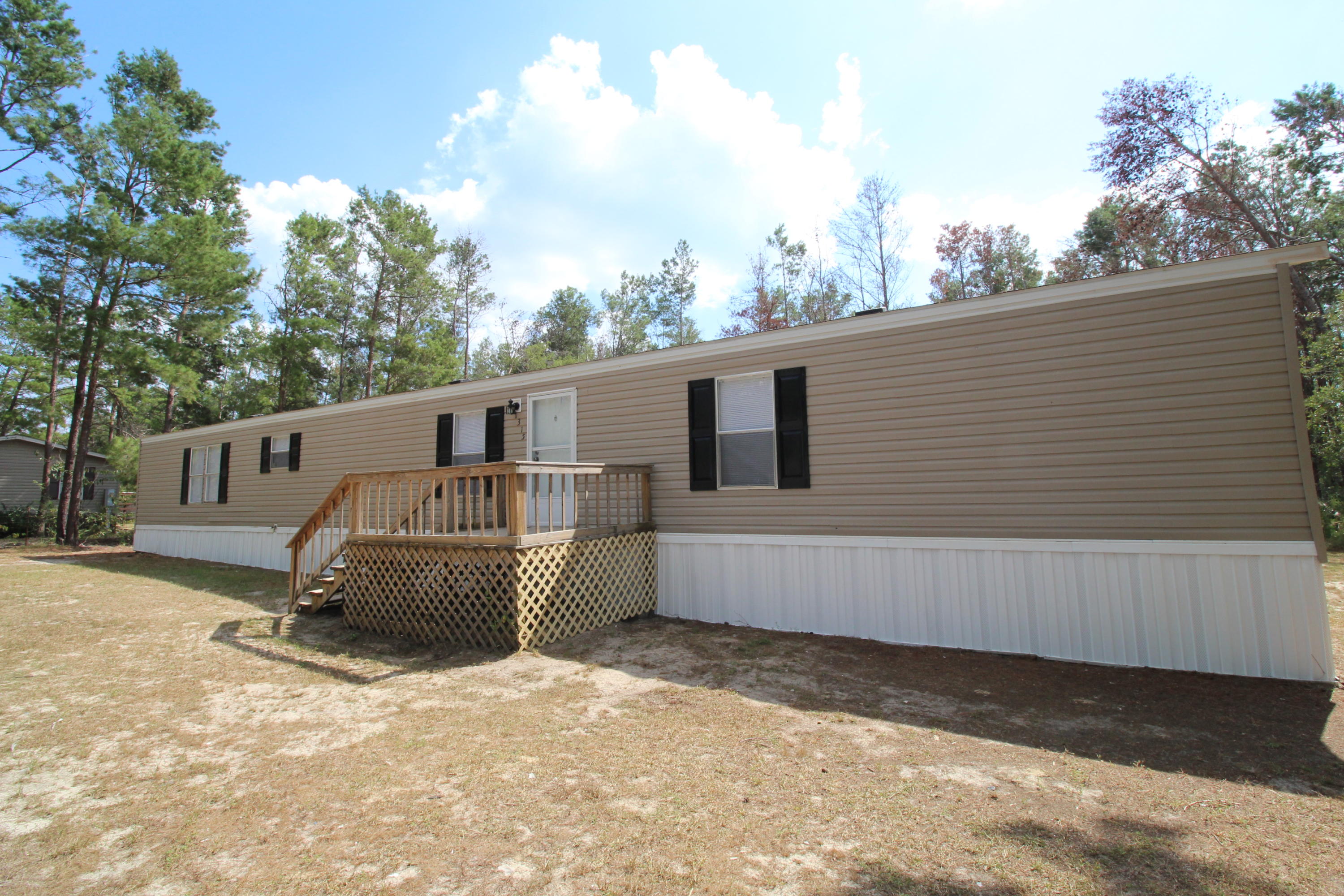 REO/AS-IS..Updated and ready to move in, this home sits on .79 acres, has 3 bedrooms, 2 baths, and space to move around. New carpet and fresh paint throughout. *All measurements approximate. **SELLER FINANCING POSSIBLE