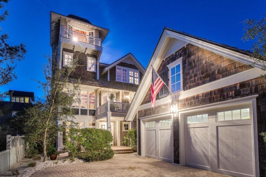 This charming Nantucket style home, built by Alan Ficarra, is the perfect home for a family to enjoy the upscale community in Watersound Beach. Amazing location, with gulf views. Walk out the front door and you are on the path to the beach! Beautiful warm and inviting home with river recovered heart pine floors and beams throughout the home. The first floor has a peaceful study surrounded by windows overlooking a water feature in the courtyard outside. There are 2 bedrooms on this level, each with its own bath. The second story is the main living area with an open kitchen, granite countertops, island, a solid mahogany wet bar with see through cabinets and copper sink. Beautiful masonry fire place in the living area. The master bedroom boasts a large walk in closet with its own private balcony. Upstairs is a large kids bunk room with plenty of room to play. There is a large crow's nest on the 4th level with amazing views.  There is plenty of storage throughout the home.