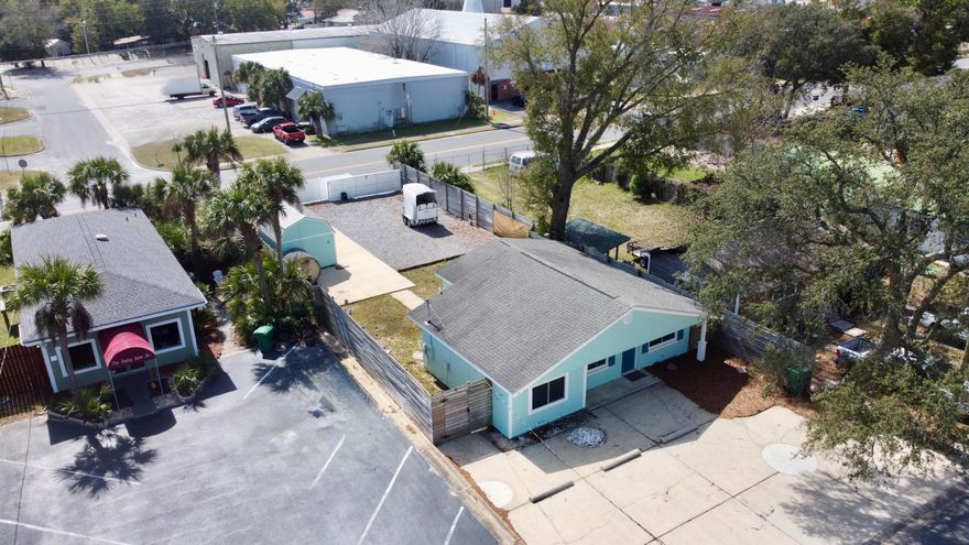 31 Kelly Ave NE in Fort Walton Beach, FL is an exceptional and highly versatile opportunity for entrepreneurs, investors, and owner-occupants seeking flexibility in a prime location. Zoned C-2 General Commercial, this completely remodeled 1,159 square foot property features four office spaces and one full bathroom, offering the ideal layout for a professional office, boutique retail or service-based business, short-term rental investment, or even a primary residence. The zoning uniquely allows you to live and work on-site, giving business owners the ability to seamlessly operate from home while building equity in a high-demand coastal market. Access and functionality truly set this property apart. With two separate vehicular entry points -- Hughes Street to the south and Kelly Avenue to the north (the main front entrance) -- the layout provides excellent traffic flow and convenience. Four dedicated parking spaces are positioned at the front of the property, while a powered rear gate opens to a paved, enclosed driveway offering secured additional parking. Outdoor electrical hookups are already in place, making RV parking simple and ready to go.

Major capital improvements add peace of mind, including a re-reroof in 2015, new windows installed in 2017, and a tankless water heater for modern efficiency. The outdoor features elevate this property even further, with a dry sauna and outdoor shower conveying with the sale, along with a large storage shed with electricity--perfect for equipment, inventory, or workshop space.

Located just minutes from downtown Fort Walton Beach, the beaches, Eglin Air Force Base, and Hurlburt Field, this property combines visibility, accessibility, and unmatched flexibility in one compelling package. Whether launching a business, expanding your portfolio, or securing a dynamic live/work space, 31 Kelly Ave NE delivers opportunity, functionality, and long-term upside all in one address.