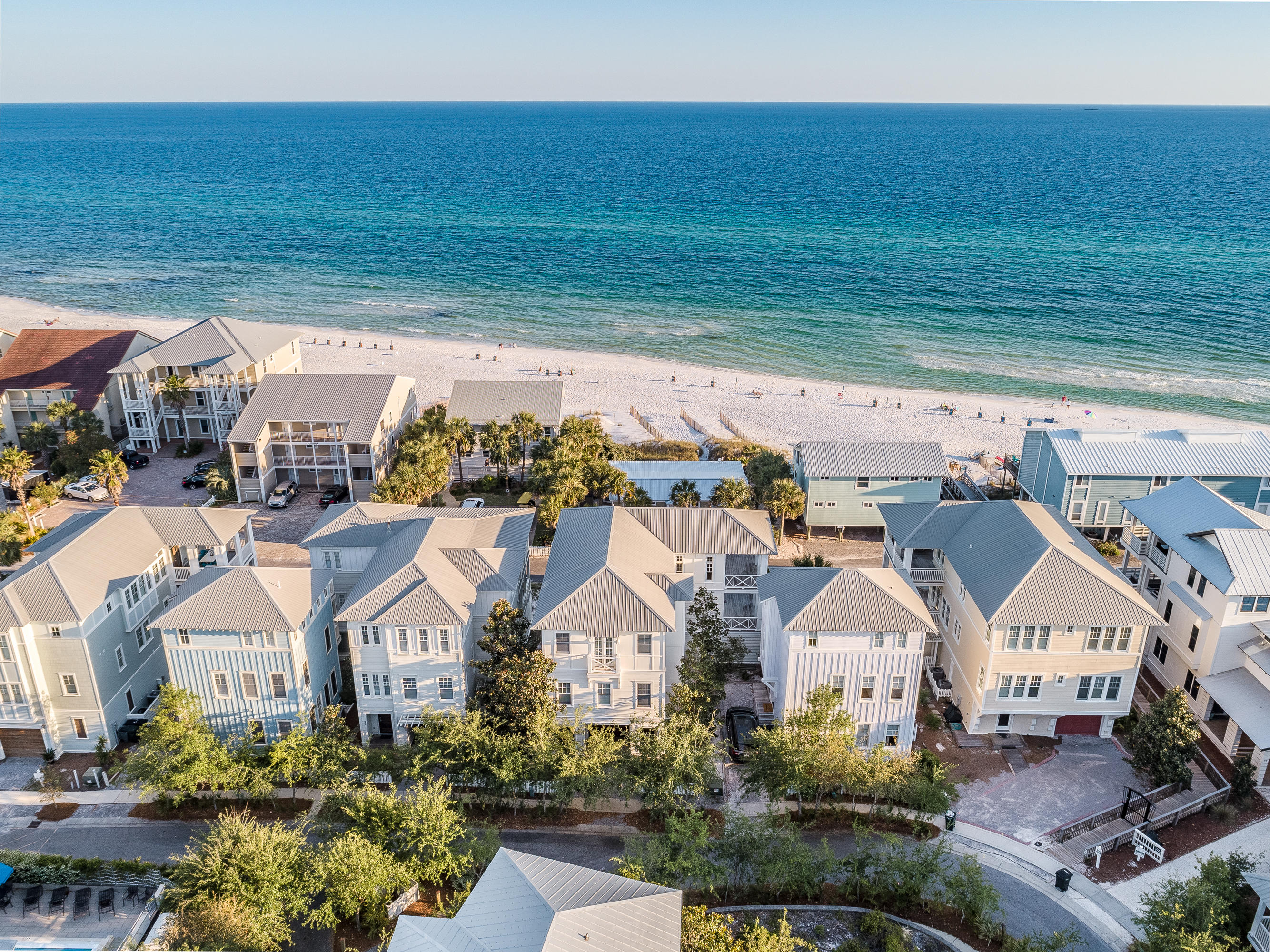 Located one back from the beach with sweeping gulf views. Exterior and interior recently painted Spring 2019. Unobstructed gulf views from vast & vaulted top floor living and dining area. An abundance of space to enjoy the beautiful views and gulf breezes with living areas and covered porches on all floors. Every bedroom offers an en-suite bath. Fabulous as a rental property or second home by the beach. Neighborhood offers 2 community pools and is located South of 30A. Only 2 miles from Seaside with nearby restaurants, boutique shopping and entertainment within the various lifestyle communities along scenic 30A. Here you are just steps from the beach access and close to Eastern Lake, one of the areas largest Coastal Dune Lakes.
