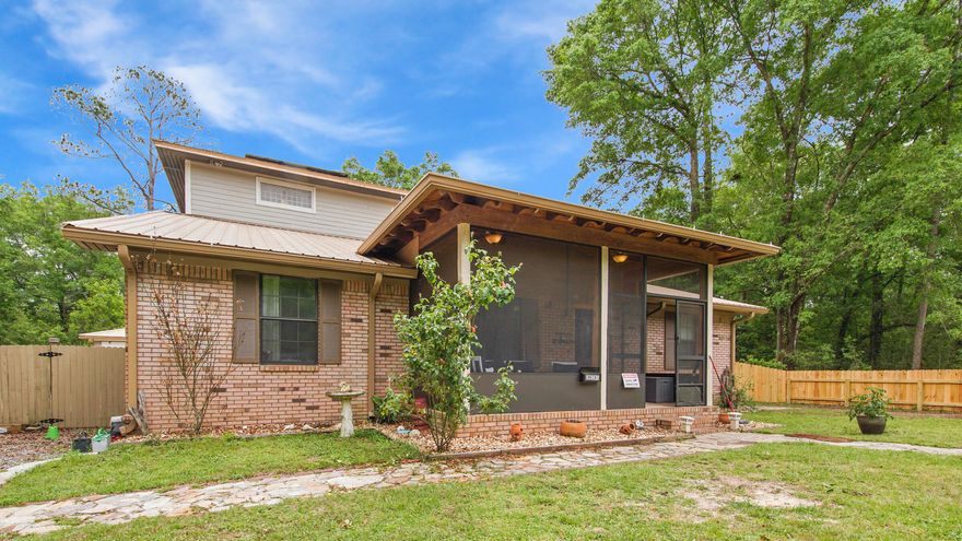 There is much more than meets the eye with this spacious, one of a kind custom home. The 2300SF addition was added by the former owner, a building contractor, with no detail or extra spared. This layout of this two story home would be great for blended or multigenerational families. It has a total of 5 bedrooms plus 2 addtl home offices that could easily be converted for a total of 7 bdrms!  The beautiful kitchen and great room ceilings soar, making it feel even more grand. This kitchen has it all, including a huge pantry, abundant cabinets/granite countertops, and details like arches and a trey ceiling. Tile, laminate and cool epoxy floors (no carpet) make it easy to maintain. You'll find the original house downstairs with a split plan and downstairs master suite and 2 additional