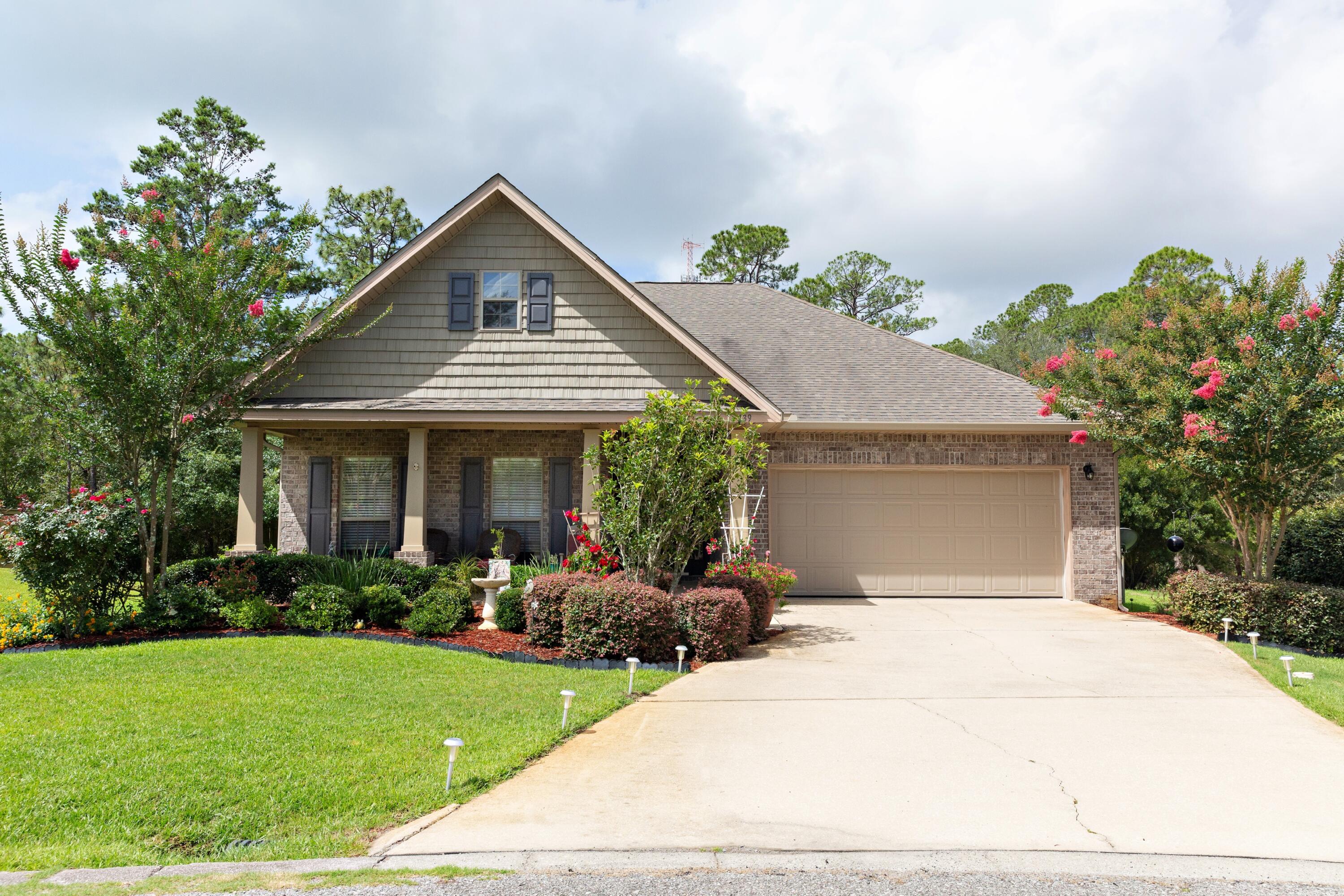 Vibrant landscaping, Southern style porch, open floorplan - this impeccably kept 3 bedroom Bonaventure is situated on a large lot in Peach Creek.  Enjoy outdoor living with a lush zoysia lawn, a butterfly garden, and screened in porch.  The dining room, kitchen, and living area open up from the foyer as you enter the home.  An oversized Owners suite  is on the opposite side of the house from the split bedrooms.  It's no secret that the Bonaventure is one of DR Horton's most sought after floorplans, and after you see the layout, you'll understand why.