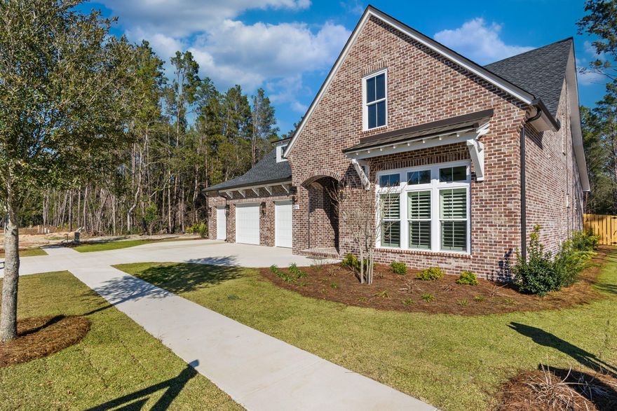 Beautiful new home buy local award winning builder.  Home features stunning views on nature preserve.  3 car garage.  Lush landscape.  Architectural detail at every turn.  10' ceilings.  Crown moulding and cased windows throughout.  Wood floors.  Furniture grade cabinetry.  Cabinets to ceiling in kitchen.  Quartz counter tops.  2 primary suites.  Fireplace.  Great covered rear patio.  Gourmet appliances.  Butlers pantry.  Separate study.  2 living areas.