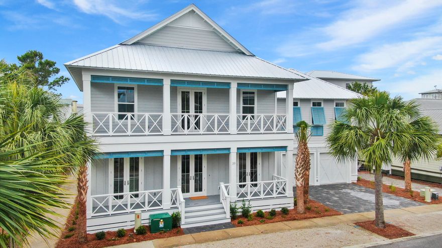 Very rare to find a main house and carriage house with a 2-car garage in Seacrest Beach. This beautifully decorated and recently constructed home (completed in May 2021) home overlooks green space and is a short walk to the 12,000 SF community pool. Main house consists of 4 bedrooms and 4 baths. The first floor consist of the open-concept floor plan with the kitchen, dining and living rooms, along with a guest bedroom, guest bath, laundry room and spacious screened porch. The 2nd floor consists of a bunk room with 4 twin beds, a guest bath with a tub/shower, an additional guest bedroom with ensuite bath and the master suite. There is also a sitting area on the 2nd floor. Other features include, hardwood floors throughout, designer tile floors in the baths, tiled showers