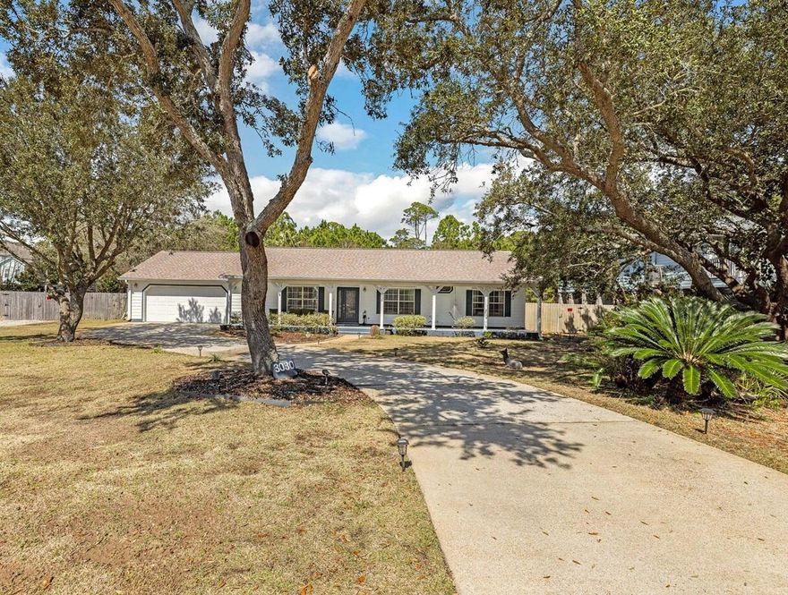 Double size lot with views of Santa Rosa Sound. Curved drive to oversize garage.  RV or large boat gravel drive and fenced parking with 30/50 Amp power, water and sewer.   12x20 outdoor storage shed.  5 live oak trees in front yard, palm trees and orange tree in back yard.  House is wind mitigated with reinforced roof structure, window coverings and 150 mph garage door.