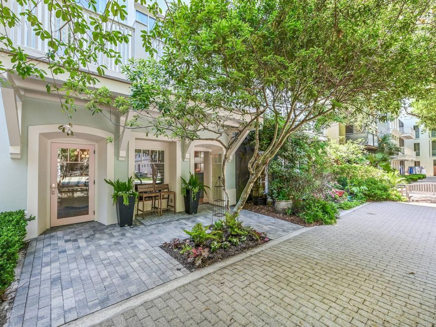 Welcome to 303 Ruskin Place, an extraordinary residence nestled in the heart of the picturesque community of Seaside, Florida. This stunning four-bedroom, three and a half bathroom home has been masterfully remodeled, offering a blend of modern luxury and timeless elegance. As you step through the front door, you'll be greeted by an all new open-concept living space bathed in natural light, featuring all new exquisite finishes. The new decor seamlessly combines coastal charm with contemporary sophistication, creating an inviting atmosphere perfect for both relaxation and entertaining. A newly decorated bedroom and bath complete the first level making this home a complete residential townhome with a two car covered carport. The kitchen is a chef's dream with renewed cabinetry and new beautiful quartz surfaces, equipped with top-of-the-line stainless steel appliances.Adjacent to the kitchen, the dining area offers a perfect setting for family dinners and intimate gatherings. There are two living spaces on the kitchen level allowing families to have unique spaces for evening entertainment. The primary suite also has an en-suite bathroom with dual vanities, a soaking tub, and a walk-in shower. Each of the additional three bedrooms has been thoughtfully re-designed with comfort and style in mind, featuring ample closet space and access to beautifully updated bathrooms. Outside, the home features the charming courtyards or Ruskin Park along with the upper roof top deck with views of the town and the gulf. The meticulously landscaped grounds enhance the home's appeal and provide a tranquil oasis for outdoor activities. Located just steps away from Seaside's iconic white-sand beaches, boutique shops, and evening dining, 303 Ruskin Place offers the quintessential coastal lifestyle. This remarkable home is a rare find, combining impeccable design, prime location, unparalleled comfort and turnkey ready completely updated in the last 18 months.