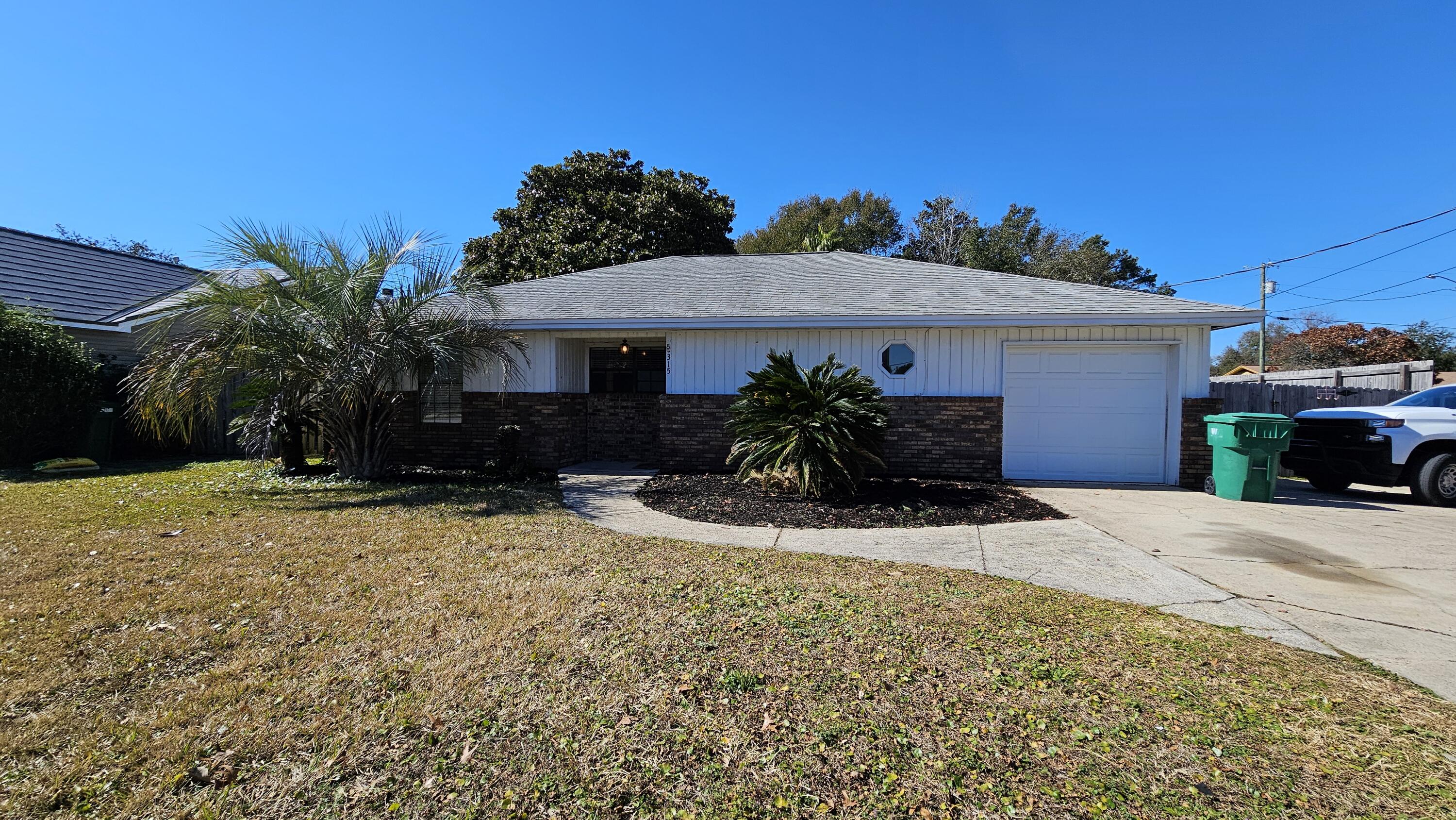 This 4 bedroom 3 bathroom home is located in the heart of Destin. The in-ground pool is located in the privately fenced in back yard. Upon entering the home, you will find an open floor plan with the living room and kitchen complete with beautiful hardwood flooring, a fireplace, and cathedral ceilings. The kitchen boasts a breakfast bar, granite countertops, with tons of counter space, recessed lighting, tile backsplash, and stainless steel appliances. The large master bedroom has a reading nook. The master bathroom has double sinks. There is a one car garage. The driveway offers plenty of space for parking. This home is pet friendly with restrictions. All residents are enrolled in the Resident Benefits Package (RBP) for $50.00/mo which includes liability insurance, credit building.