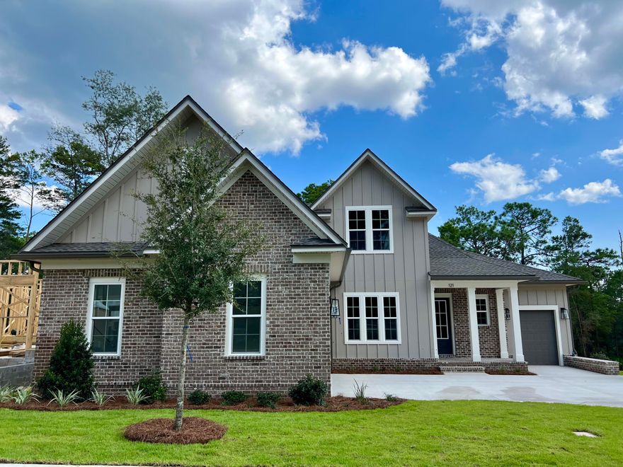 Stunning 4 bedroom, 3.5 bath home with an office and bonus room in Deer Moss Creek Niceville! Situated on a lot with no homes directly behind, this NEW home boasts a large, open living area with engineered hardwood throughout and 10' ceilings on the first floor and 9' ceilings on the second. You will find the great room on the main floor along with an office, 2nd bedroom, laundry, and powder room. Upstairs you'll find 2 large bedrooms, full bath, 20x20 bonus room with a wet bar, and awesome attic storage. The kitchen has Woodharbor cabinets with soft close drawers. This home has front and rear covered porches, with brick covered floors on the front porch. Deer Moss Creek features sidewalks, walking trails, parks, gazebo, and a future club house. Projected completion: October 2022.