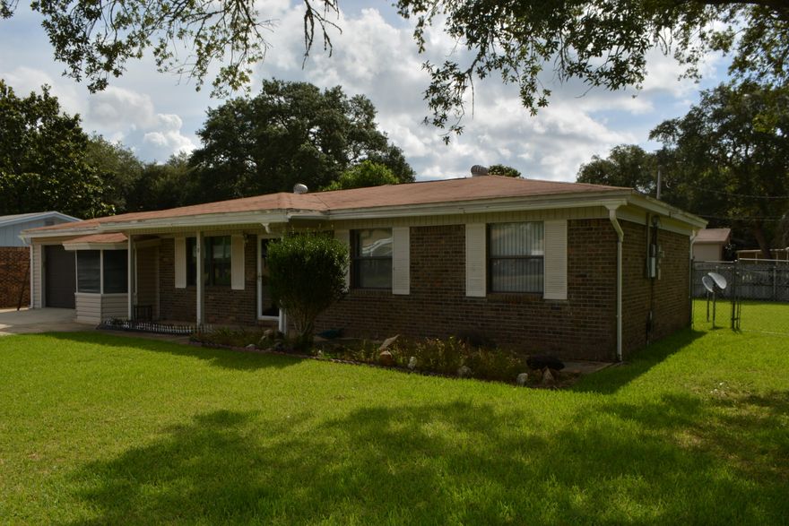 ** LOCATION, LOCATION, LOCATION!! ** SPACIOUS home located 2 miles from Eglin Air Force Base! This home sits on a HUGE CORNER LOT and features not 1, not 2 but 3 LIVING AREAS! Yes! A LIVING ROOM, FAMILY ROOM & DEN/FLORIDA ROOM! Not only that, but this home has an eat in kitchen area AND a FORMAL DINING ROOM! LOADS OF SPACE in this well maintained home! Indoor Laundry room that is also HUGE and has ample room for additional storage if need be. Kitchen has a STAINLESS SMOOTH TOP RANGE, REFRIGERATOR W/ICE MAKER and a MICROWAVE HOOD VENT. The Backyard is fully fenced and has a LARGE SHED which could be used as a WORKSHOP. Come see this home!! Call for more details.