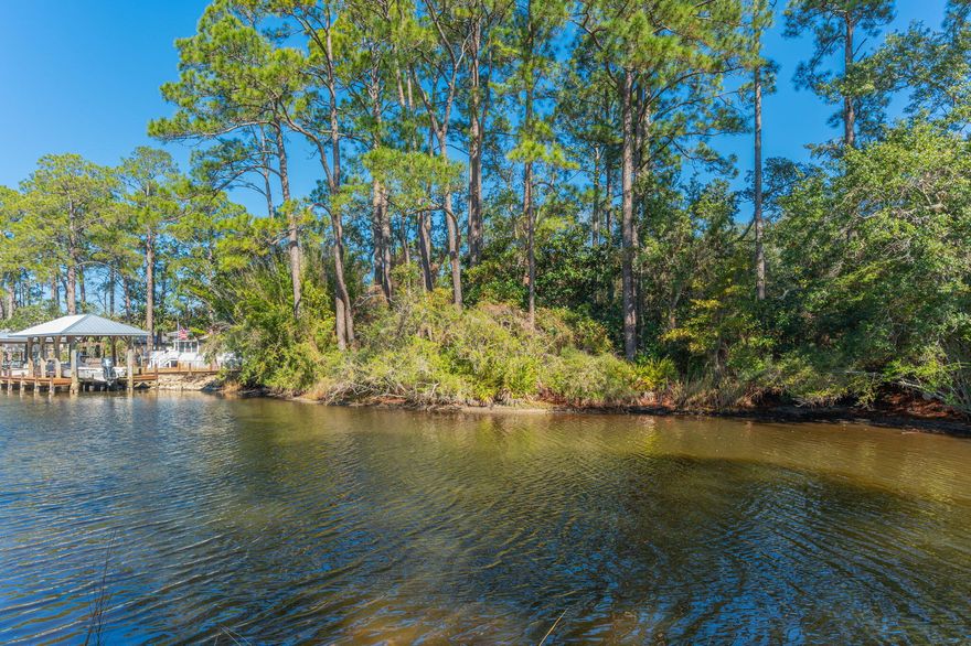 Discover the perfect opportunity to build your dream home on this exceptional canal-front lot in desirable Santa Rosa Beach. Nestled along a peaceful waterway with direct access to Choctawhatchee Bay, this property offers the ideal blend of coastal living and everyday convenience. Enjoy boating, kayaking, paddleboarding, or sunset cruises right from your backyard, with quick passage to the bay and nearby Gulf waters.  This spacious lot provides ample room for a custom-built residence, outdoor living areas, and dock potential, making it ideal for both full-time living or a vacation retreat. Surrounded by natural beauty and established homes, the setting offers privacy while remaining just minutes from pristine white-sand beaches, dining, shopping, and all that 30A and Santa Rosa Beach have  to offer.  Whether you're envisioning a primary residence, second home, or investment property, this waterfront lot presents a rare chance to create your own slice of paradise on Florida's Emerald Coast.
