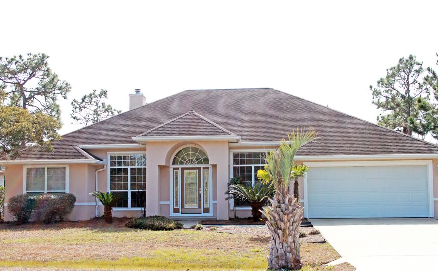 Beautifully remodeled home in gated community close to everything! Pelican Bay homeowners enjoy a deeded bay front private park and dock along with tennis courts. Located on a cul-de-sac this home is not only in an exceptional location it has the highly desired floor plan. Light is the first thing you will notice upon entering through the foyer between the OFFICE and dining room. Living room has NEW wood floors, built-in book cases and fireplace with a lovely view of the LARGE fenced back yard through the sliding glass doors. Kitchen has a counter height bar and opens to a breakfast area. NEW espresso colored cabinets, NEW granite countertops, NEW stainless appliances along a family size pantry.