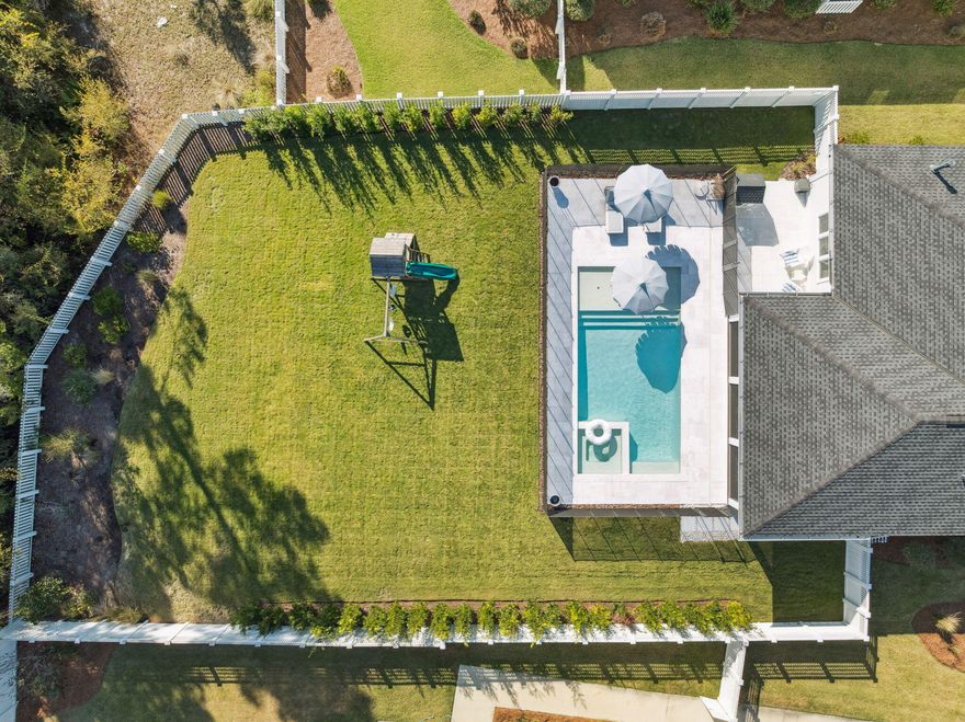 *COMING SOON* Located in the exclusive golf community of Watersound Origins, this beautifully customized home blends refined coastal living with an incredible private outdoor oasis. Set on a quiet street and backing to a wooded preserve, the property showcases one of the largest and most tranquil backyards in the neighborhood--including an existing pool and plenty of green leisure space, and spacious enough for future additions such as a pool house. Built in 2021 and impeccably maintained by its original owners, this one-of-a-kind residence is filled with thoughtful upgrades, designer finishes, and timeless architectural details. Interior features include 10-foot ceilings, a cozy fireplace, quartz countertops, LVP flooring throughout, shiplap accents, crown molding, French office doors, dimmable Serena & Lily lighting, a spa-inspired primary bathroom with a rainhead shower, abundant natural light, and custom wood blinds on every window.

Designed for the chef and entertainer, the open-concept kitchen impresses with a 48" gas range and hood, secondary steam oven, dry bar with beverage fridge, oversized island, walk-in pantry, and extensive custom cabinetry. The 2-car garage offers a professionally installed ceiling rack system for efficient storage.

Step outside to your own personal resort-style sanctuary. The oversized screened porch leads to a luxury heat-reflecting travertine deck, dedicated gas grill pad, and a stunning private saltwater pool + spa featuring water fountains and a large sun shelf. A top-rated Katchakid removable safety fence, lush landscaping, and a 6-foot enclosed white picket fence lined with privacy hedges create a serene, safe, and beautifully finished outdoor environment. A removable children's swing set further enhances its family-friendly appeal.

Perfectly located just 5 minutes from the Emerald Coast's best public beaches, residents enjoy premier community amenities including pickleball, golf, tennis, Lake Powell access, fitness center, resort-style pool, walking trails, and playground. Everyday conveniences such as Publix and Starbucks are nearby in the neighborhood town center, with world-class dining and boutiques just minutes away in Alys Beach and Rosemary Beach.

A rare offering in Watersound Origins  beautifully designed, meticulously maintained, and showcasing one of the community's most sought-after backyards. This exceptional home is truly move-in ready and won't last long.