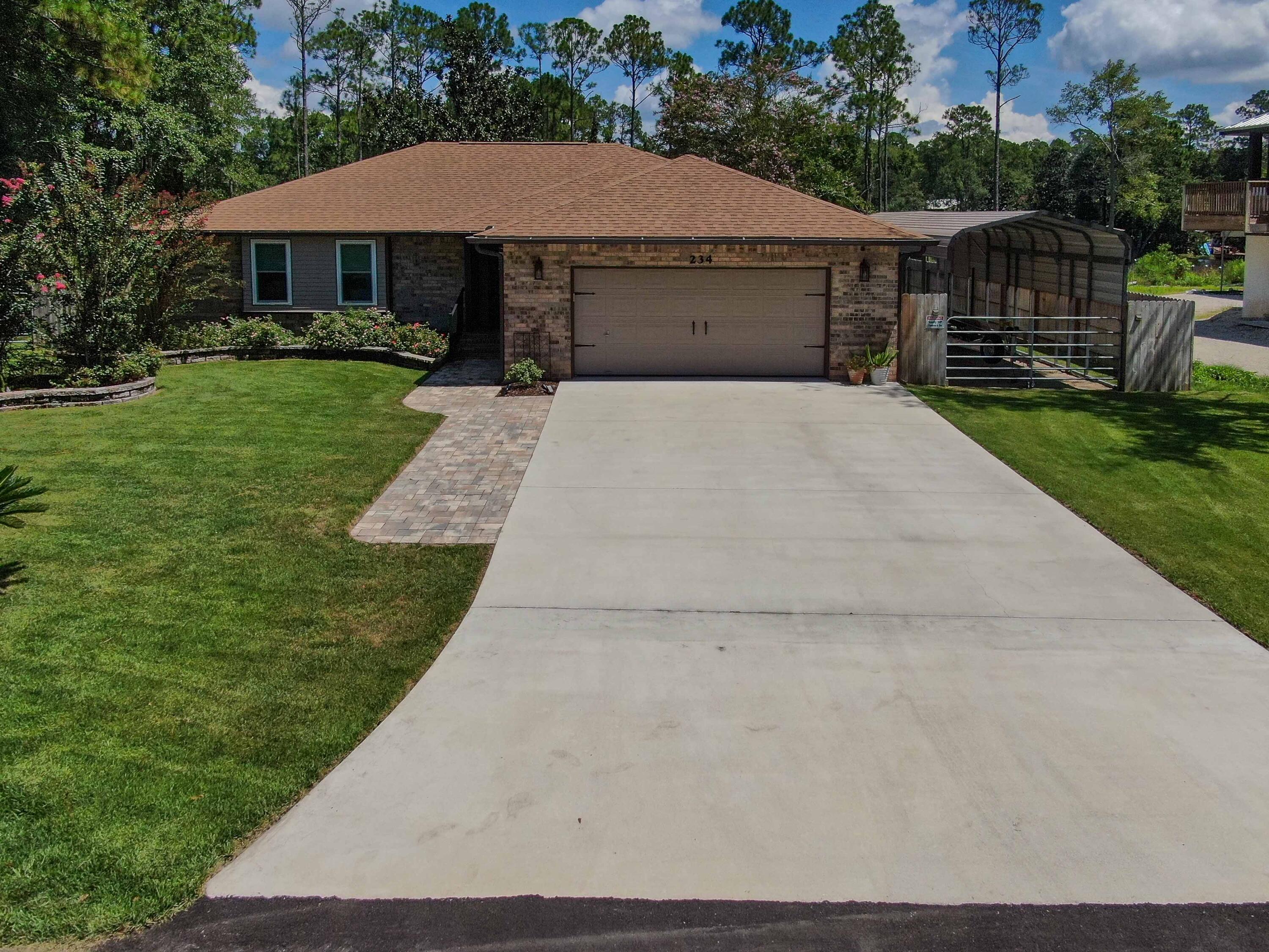 Rare opportunity to acquire an immaculate residence with 122 ft. of WATERFRONT on 3/4 acre of manicured grounds! Over $140,000 in recent upgrades and additions have made this personal retreat a showcase of Florida living! A spectacular dock features the amenities boaters and fisherman crave, and there is quick access to the bay and gulf. There is also a large electrified workshop, pole barn, patios, firepit and room for a pool. Inside, the warm open floorplan hosts a stunning heated and cooled sunroom with gorgeous views, an oversized living room with a fireplace and an updated kitchen and eating area. Three roomy bedrooms and two full baths offer plenty of space to work, study and entertain. Fresh paint, new moldings, baseboards, ceiling fans, custom lighting and electrical fixtures.