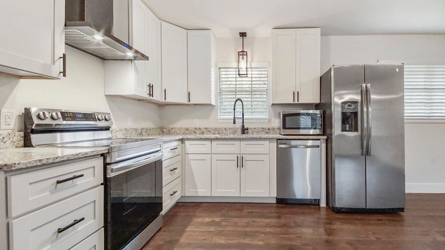 The interior of 6179 Sundew has just received a total update and renovation of the interior of the home. The kitchen was gutted and new soft close cabinets with granite counters were installed as well as stainless steel appliances, The living room was reconfigured to give an open floorplan with dining area as well as the kitchen. New laminate floors were installed throughout. New light fixtures and switches throughout, Both bathrooms have new vanities and toilets. The home itself is all brick and located on over an acre. The location is still close to shopping and schools. A quick commute to all of the military bases as well. This home checks all of the boxes and is ready to move in for the next owner. Take a look soon!! Home being sold ''As Is''