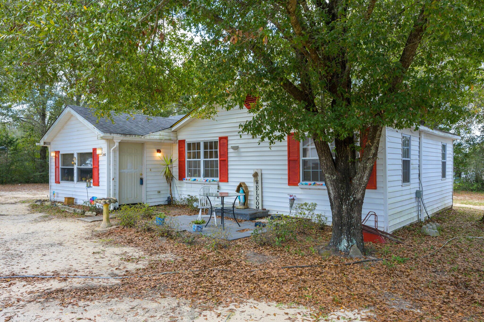 This 2 bedroom 1 bath is a great Starter Home/Retirement or Rental Investment. Corner Lot  .51 Chain Link/Good Size Living Room (22 x 13) /Wood Burning Fireplace in Dining Area/The Kitchen has Plenty of Cabinet Space. The Bedrooms are Located in the Back of the home Separated by the Petite Bathroom. If Your Looking for a Convenient Location to Shopping, Schools, and Hospital, this Place is Waiting for You!!  11 miles North of Duke Field, and Approx. 30 miles North of the Beaches of Okaloosa County. ~ Roof 2014   WH 2023- Seller says AS IS-Cash/Conventional Sale Only~